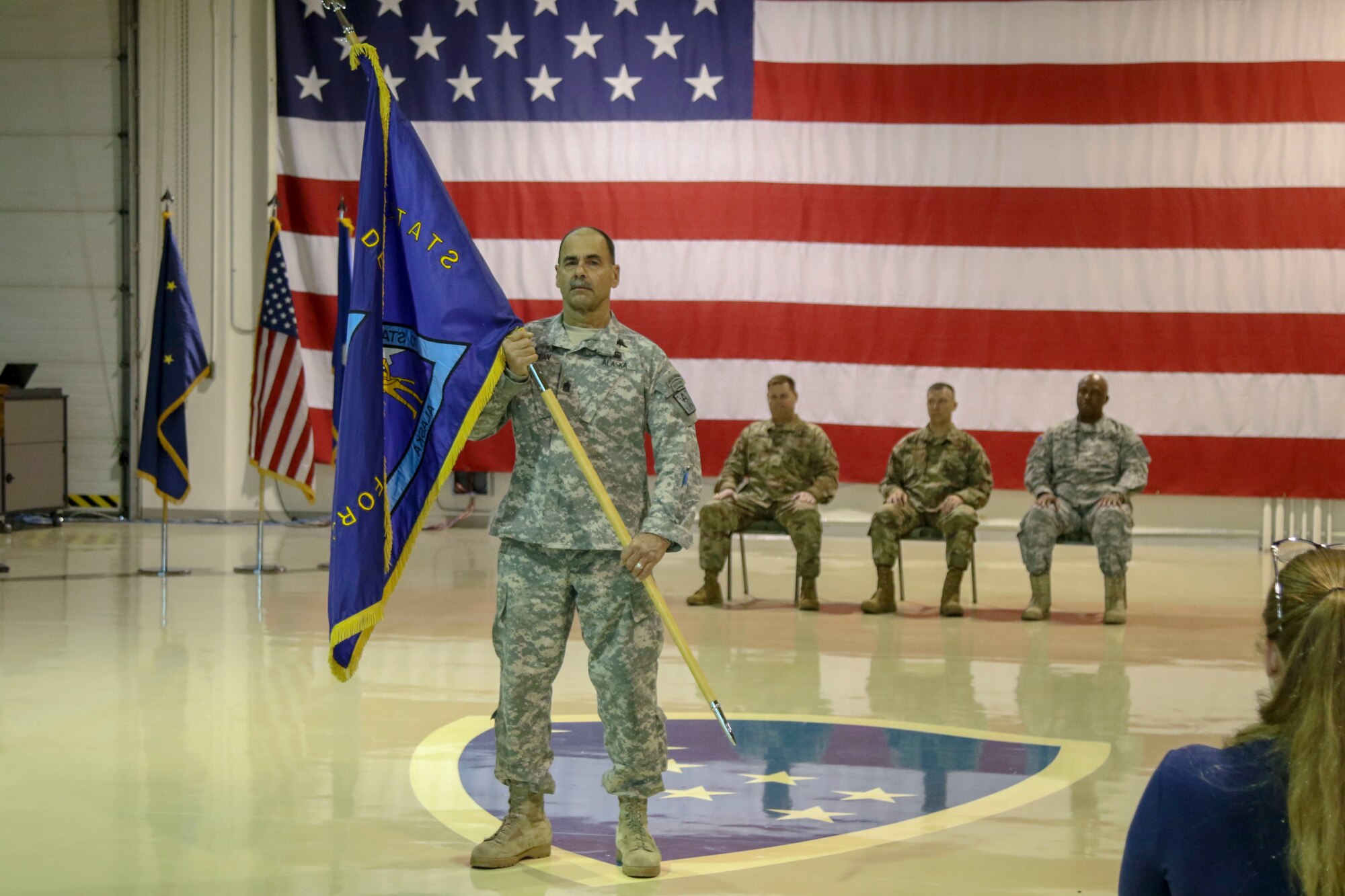 The Alaska State Defense Force had a change of command ceremony at the Alaska National Guard armory on Joint Base Elmendorf-Richardson, October 16, 2019, where Col. John James relinquished command to Col. Simon Brown. The ceremony was presided over by Brig. Gen. Torrence Saxe, the adjutant general of the Alaska National Guard.