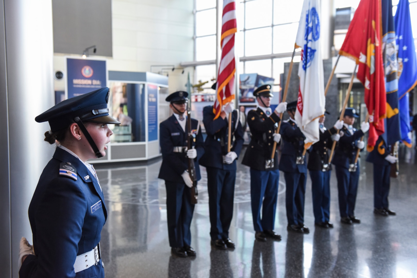 Cadet 2nd Lt. Michaela Melancon, of the Civil Air Patrol’s National Capital Wing, sings the national anthem during a joint color guard performance at DIA Headquarters, Oct. 10.