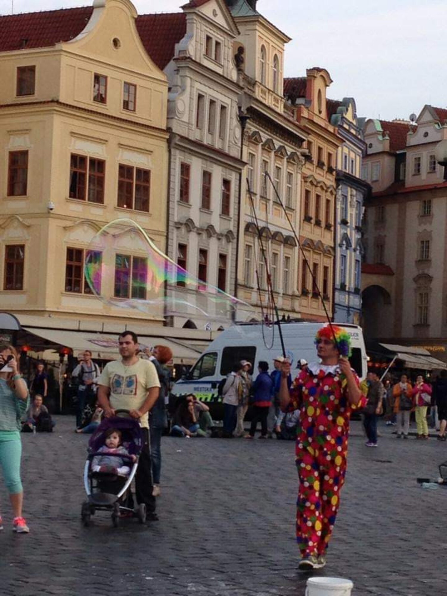 A clown entertains a crowd, Copenhagen, Denmark, 2014.