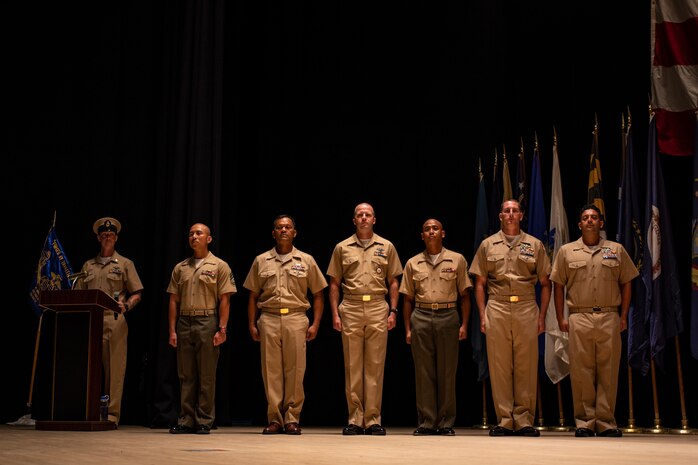 U.S. Marines and Sailors conduct a pinning ceremony for the latest Chief Petty Officer selectees at Marine Corps Air Station Iwakuni, Japan, Sept. 13, 2019. A Chief Petty Officer acts as the bridge between the commander and the non-commisioned sailors, acting on behalf of all Sailors in the U.S. Navy.