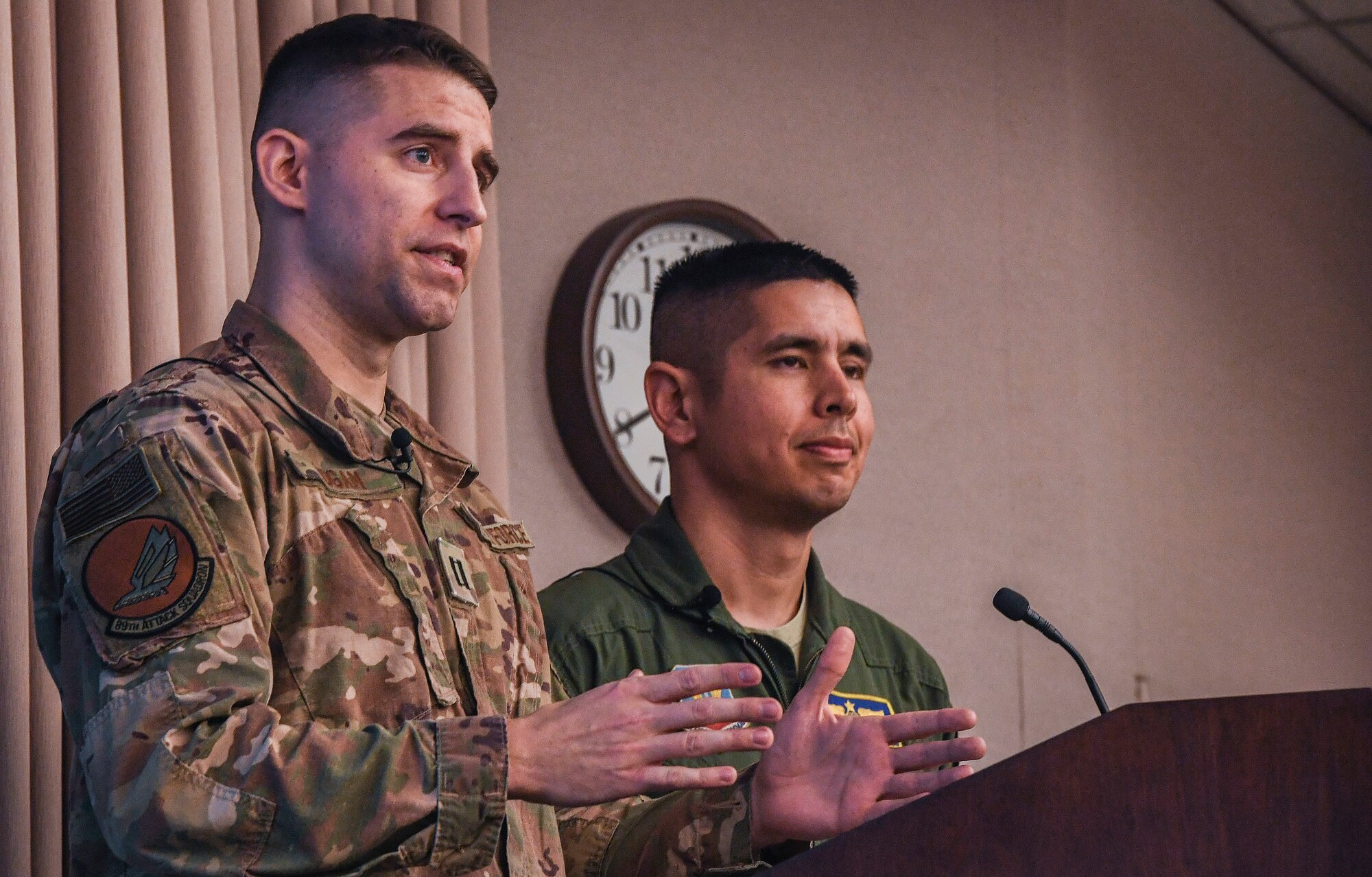 Capt. Dallas Hogan, 89th Attack Squadron intel assistant director of operations, Ellsworth Air Force Base, South Dakota, and 89th AS Simulator Systems Chief Maj. Phillip Geddes, pitch their idea to the judge’s panel during Air Combat Command’s 2020 Spark Tank competition at the Creech Conference Center on Joint Base Langley-Eustis, Virginia, Oct. 16, 2019. Airmen from the 89th AS submitted a Spark tank idea proposing an integrated intelligence training workstation. Hogan and Geddes believe their workstation will help the Air Force by replicating how Airmen operate in a real-world environment – maximizing realism while eliminating unrealistic training. (U.S. Air Force photo by Tech. Sgt. Nick Wilson)