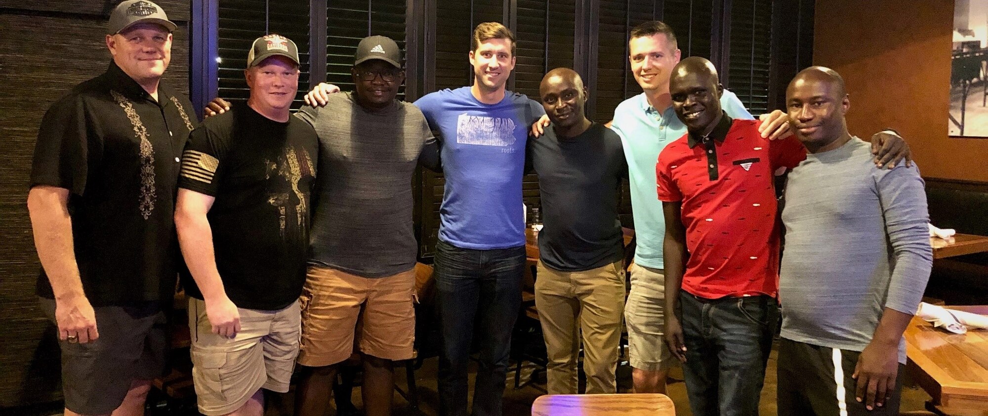 U.S. military members take the opportunity to build partnerships during a dinner with Kenyan Air Force aircrew members attending the C-145 Skytruck aircraft training at Hurlburt Field, Florida, Oct. 8, 2019. (Courtesy Photo)