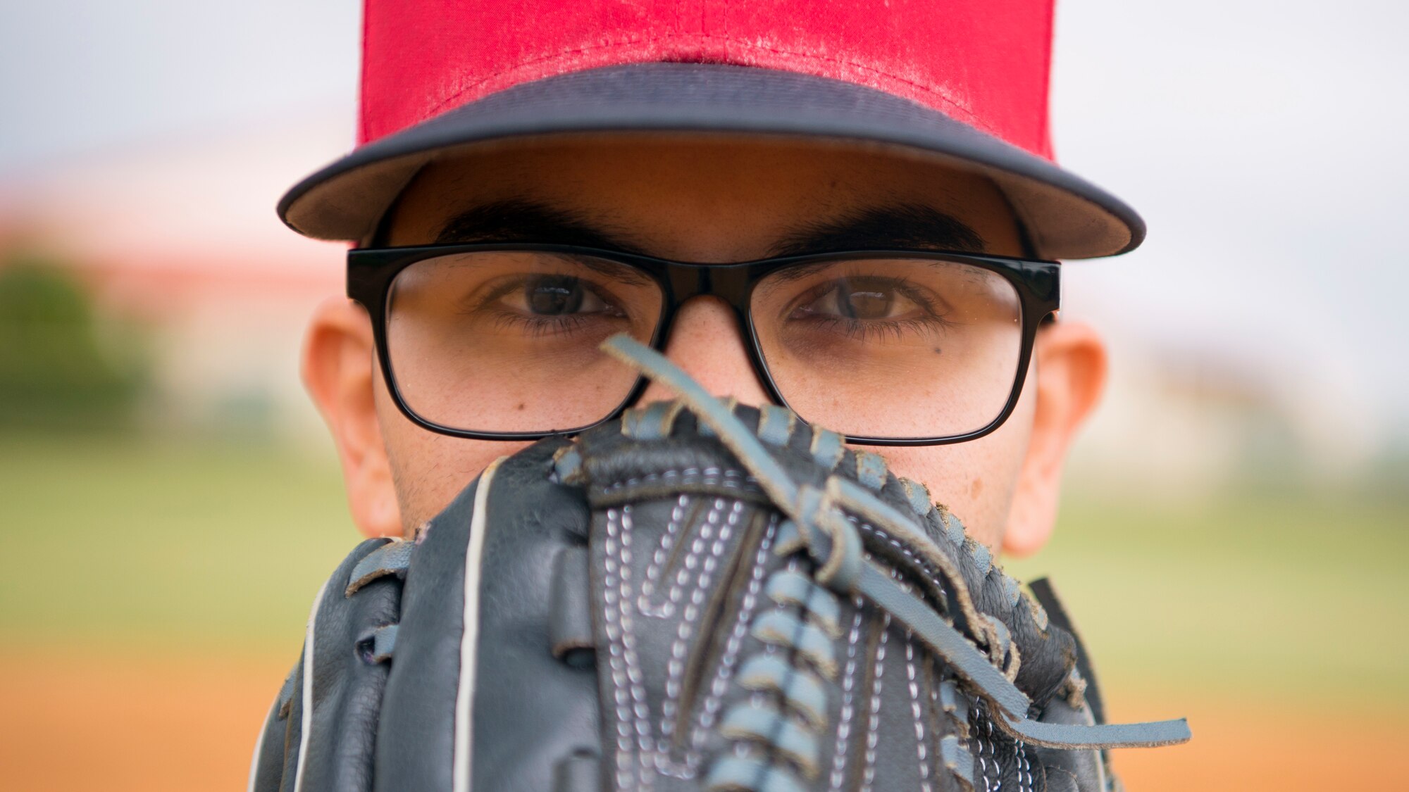 U.S. Air Force Staff Sgt. Eduardo Garcia, a 6th Civil Engineer Squadron (CES) NCO in charge of commander support staff, prepares to throw a pitch during the “Battle of the Badges” softball game at MacDill Air Force Base, Fla., Oct. 9, 2019.