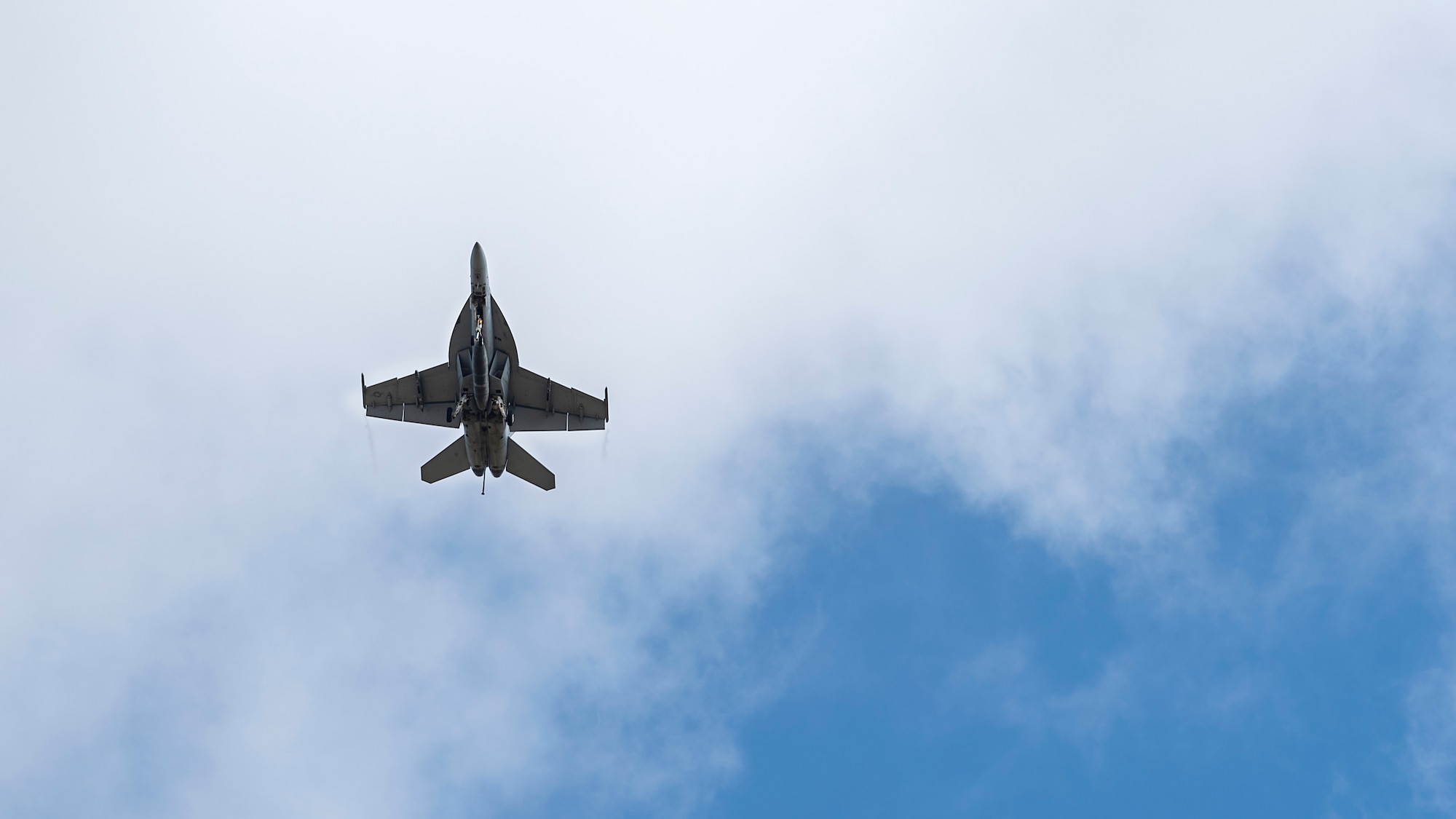 A U.S. Navy Strike Fighter Squadron 106 F/A-18F Super Hornet aircraft from Naval Air Station Oceana, Va., flies over MacDill Air Force Base, Fla., Oct 16, 2019. Eighteen Super Hornets trained at MacDill from Oct. 1-19, 2019.