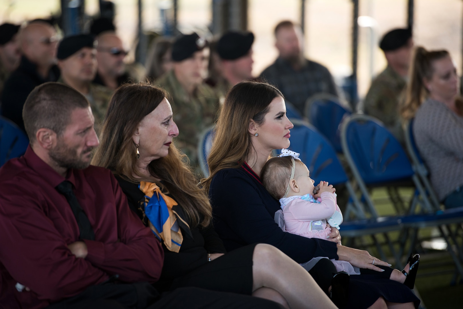 The family of U.S. Air Force Capt. Daniel Hill, incoming commander, listens as Capt. Hill speak to the audience during the activation and assumption of command ceremony of Detachment 2, Combat Training Squadron, Sept. 17, 2019, at Joint Base San Antonio-Medina Annex, Texas.