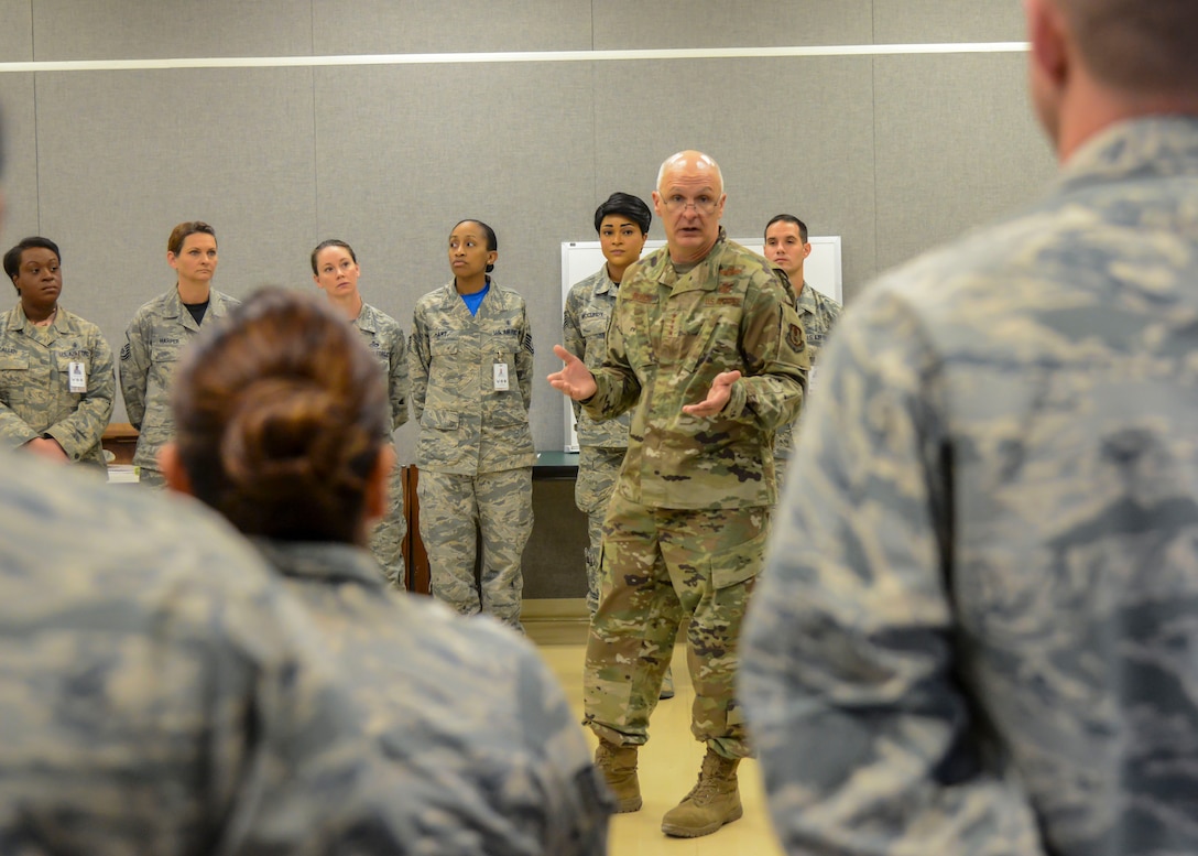 Gen. Arnold Bunch Jr., Commander, Air Force Materiel Command, talks with members of the 412th Medical Group during his visit to Edwards Air Force Base, California, Oct. 18. (U.S. Air Force photo by Giancarlo Casem)