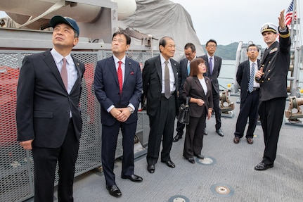 Lt. Cmdr. Bobby Wayland, gives a ship tour to the mayor of Uki city, Kenshi Morita and his staff.