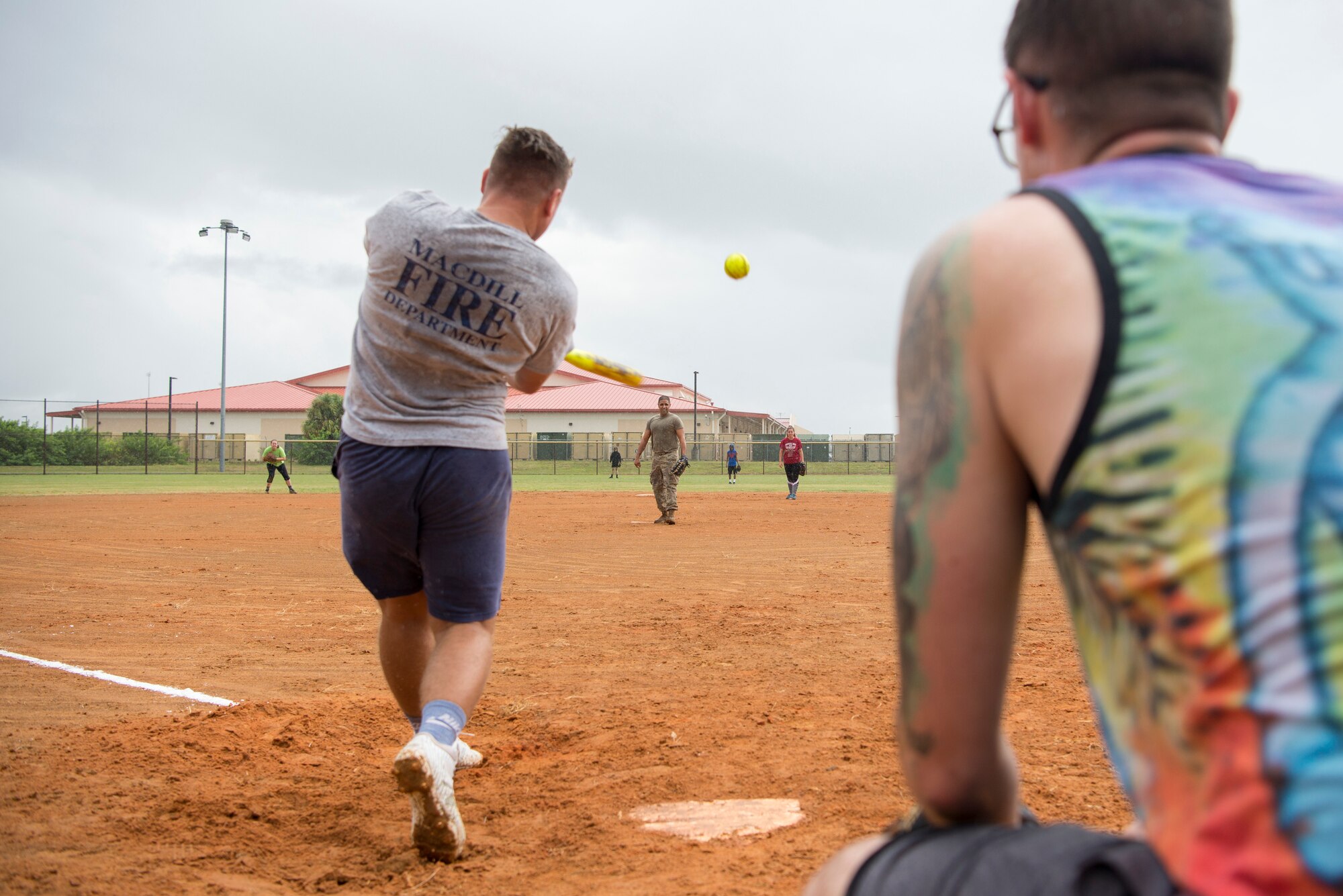 U.S. Air Force Staff Sgt. Hunter Larson, a 6th Civil Engineer Squadron (CES) Fire Emergency Services Flight firefighter, hits a homerun during a “Battle of the Badges” softball game during Fire Prevention Week at MacDill Air Force Base, Fla., Oct. 9, 2019.