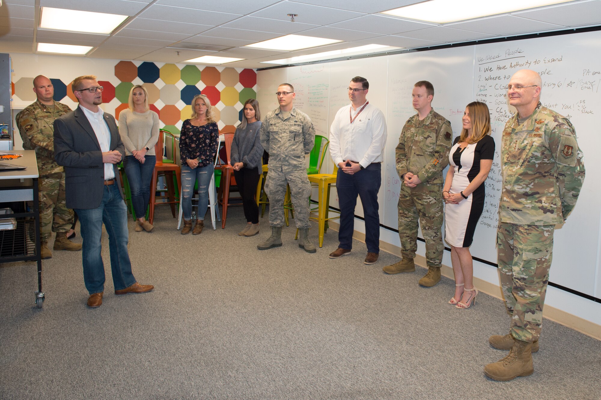 Gen. Arnold Bunch, Commander, Air Force Materiel Command, receives a brief from members of the SparkED innovation team, during his visit to Edwards Air Force Base, California, Oct. 18. The innovation team helps cultivate innovative ideas into viable plans. (U.S. Air Force photo by Richard Gonzales)