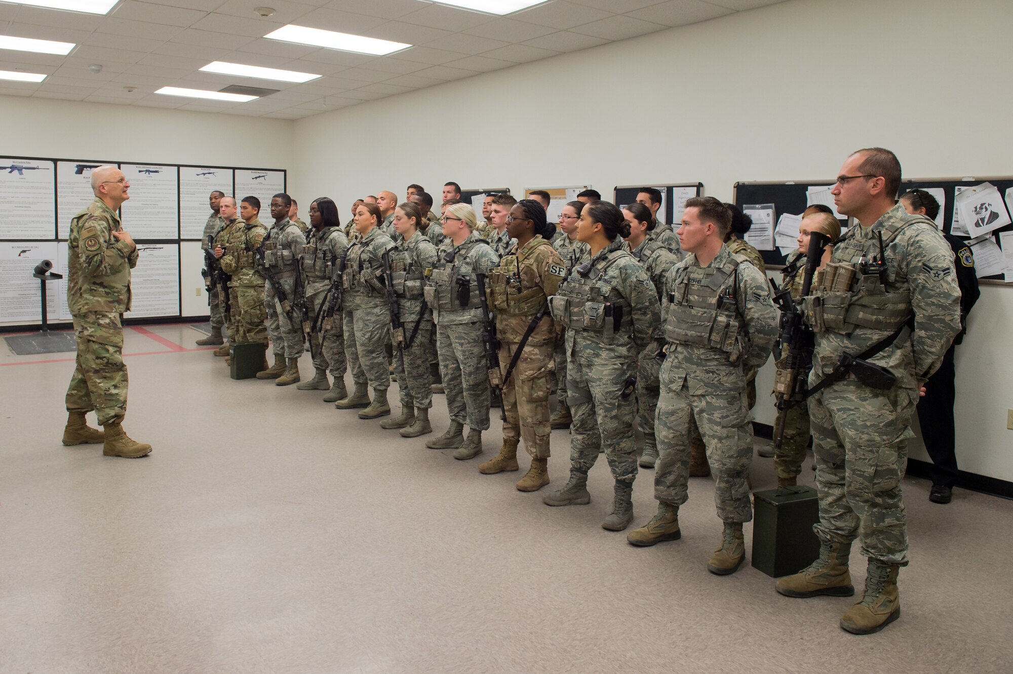 Gen. Arnold Bunch, Commander, Air Force Materiel Command, talks to members of the 412th Security Forces Squadron during his visit Edwards Air Force Base, California, Oct. 18. (U.S. Air Force photo by Richard Gonzales)