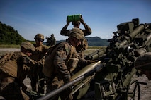 U.S. Marines with Alpha Battery, Battalion Landing Team, 3rd Battalion, 5th Marine Regiment, 11th Marine Expeditionary Unit, prepare to fire an M777 Howitzer during exercise KAMANDAG 3 at Colonel Ernesto P. Ravina Air Base, Philippines, Oct. 13, 2019. KAMANDAG helps participating forces maintain a high level of readiness and responsiveness, and enhances combined military-to-military relations, interoperability, and multinational coordination. KAMANDAG is an acronym for the Filipino phrase “Kaagapay Ng Mga Manirigma Ng Dagat,” which translates to “Cooperation of the Warriors of the Sea,” highlighting the partnership between the U.S. and Philippine militaries.