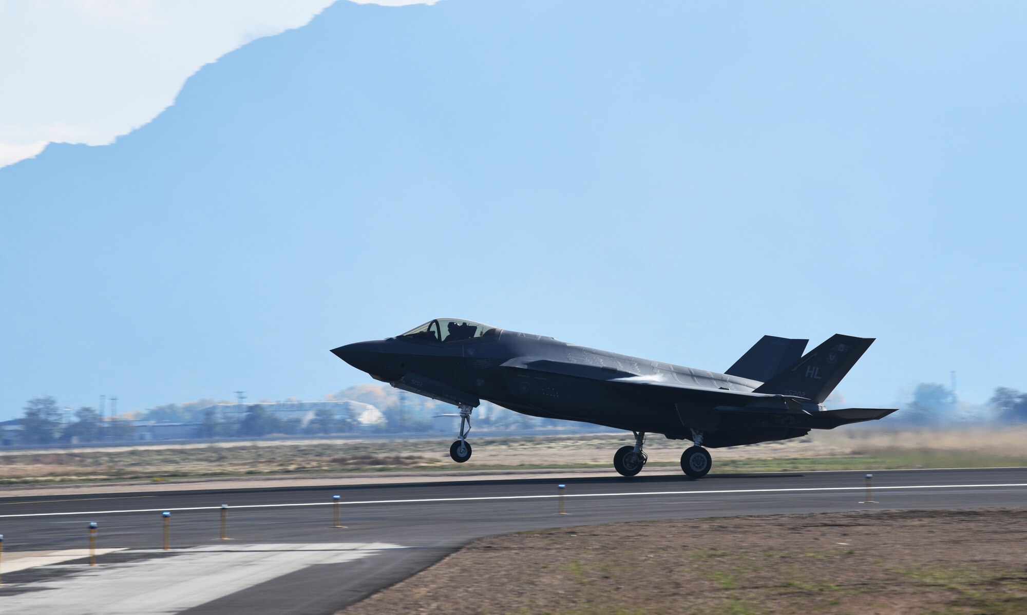 An F-35A Lightning II takes off from Hill Air Force Base, Utah. Make-A-Wish children visited the 388th Fighter Wing where they spent the day learning what it's like to be a pilot. They received flight suits, name tapes, patches, and wings. (U.S. Air Force photo by Micah Garbarino)