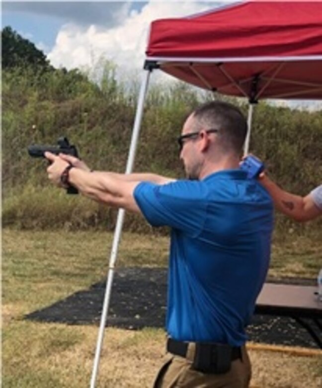 Maj. Jesse Campbell, Current Operations Integrating Cell (412th Theater Engineer Command), engages targets at the Mississippi Steel Challenge Championship in a Carry Optics Division event. This event also served as a charity for The Boy Scouts of America. Maj. Campbell won his skill Classification in the Carry Optics Division.