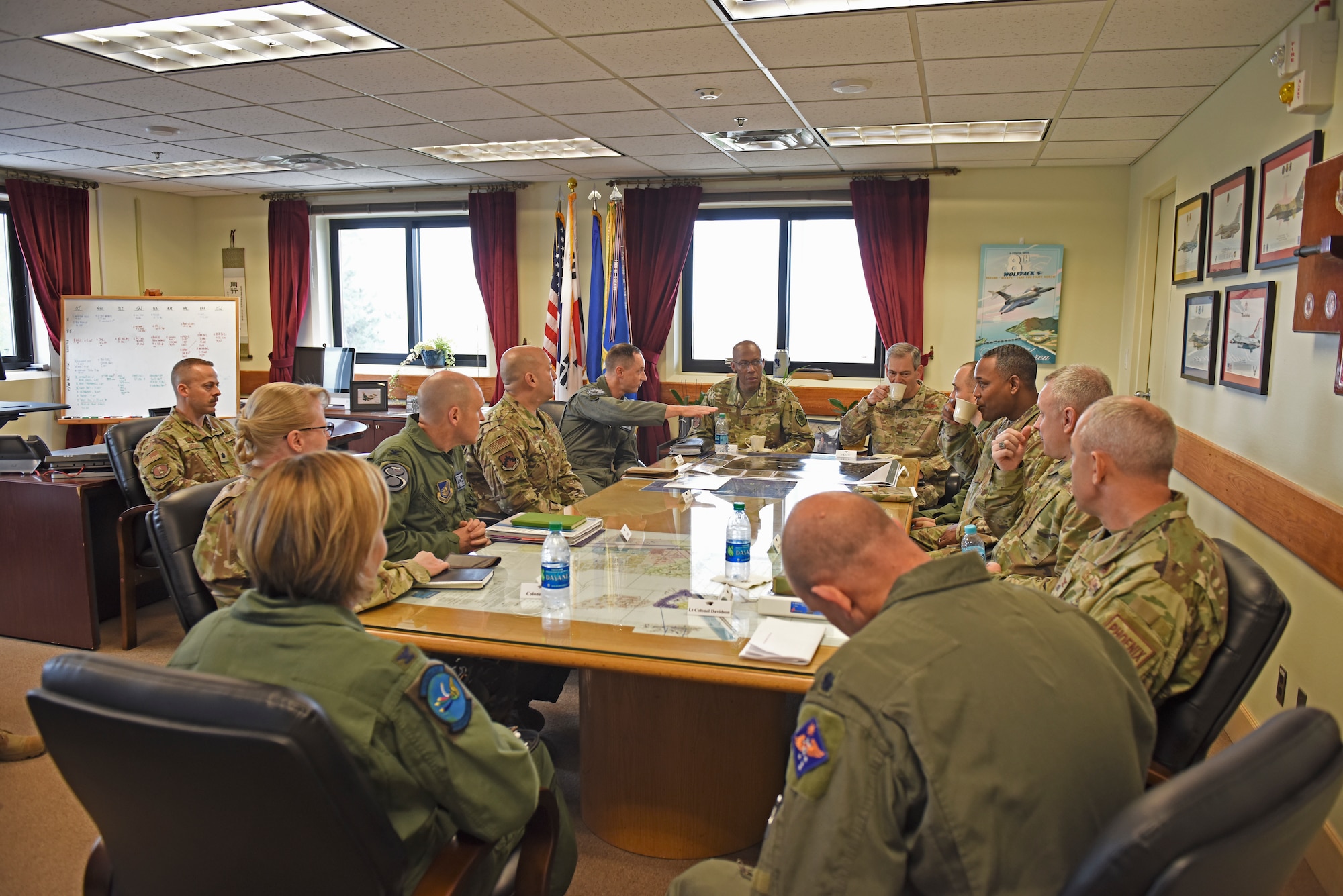 U.S. Air Force Gen. CQ Brown, Jr. Pacific Air Forces commander, and Lt. Gen. Kenneth Wilsbach, Seventh Air Force commander, talk with 8th Fighter Wing leaders at Kunsan Air Base, Republic of Korea, Oct. 18, 2019. PACAF is responsible for delivering agile air, space and cyberspace capabilities in support of U.S. Indo-Pacific Command’s objectives while uniting allies and partners to enhance regional stability. (U.S. Air Force photo by Staff Sgt. Mackenzie Mendez)