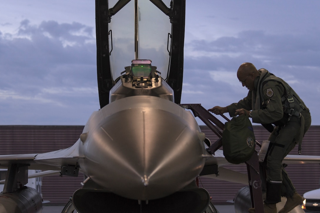 Gen. CQ Brown, Jr., Pacific Air Forces commander, climbs into a 36th Fighter Squadron F-16 Fighting Falcon prior to take off at Osan Air Base, Republic of Korea, Oct. 18, 2019. After gaining an in-depth exposure to the installation’s unique mission, Brown visited Kunsan AB to explain PACAF’s priorities and how vital the Korean Peninsula is in contributing to the Indo-Pacific region’s security and stability (U.S. Air Force photo by Staff Sgt. Greg Nash)