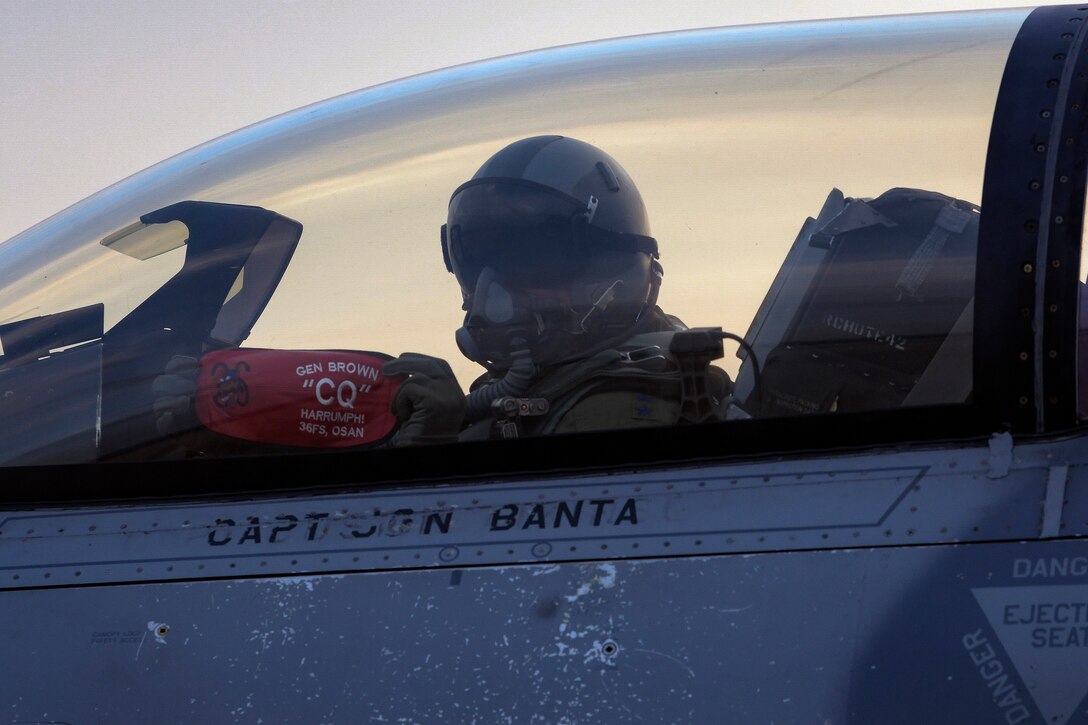 Gen. CQ Brown, Jr., Pacific Air Forces commander, poses with a 36th Fighter Squadron “Harrumph!” prior to taking off in an F-16 Fighting Falcon at Osan Air Base, Republic of Korea, Oct. 18, 2019. After gaining an in-depth exposure to the installation’s unique mission, Brown visited Kunsan AB to explain PACAF’s priorities and how vital the Korean Peninsula is in contributing to the Indo-Pacific region’s security and stability. (U.S. Air Force photo by Staff Sgt. Greg Nash)