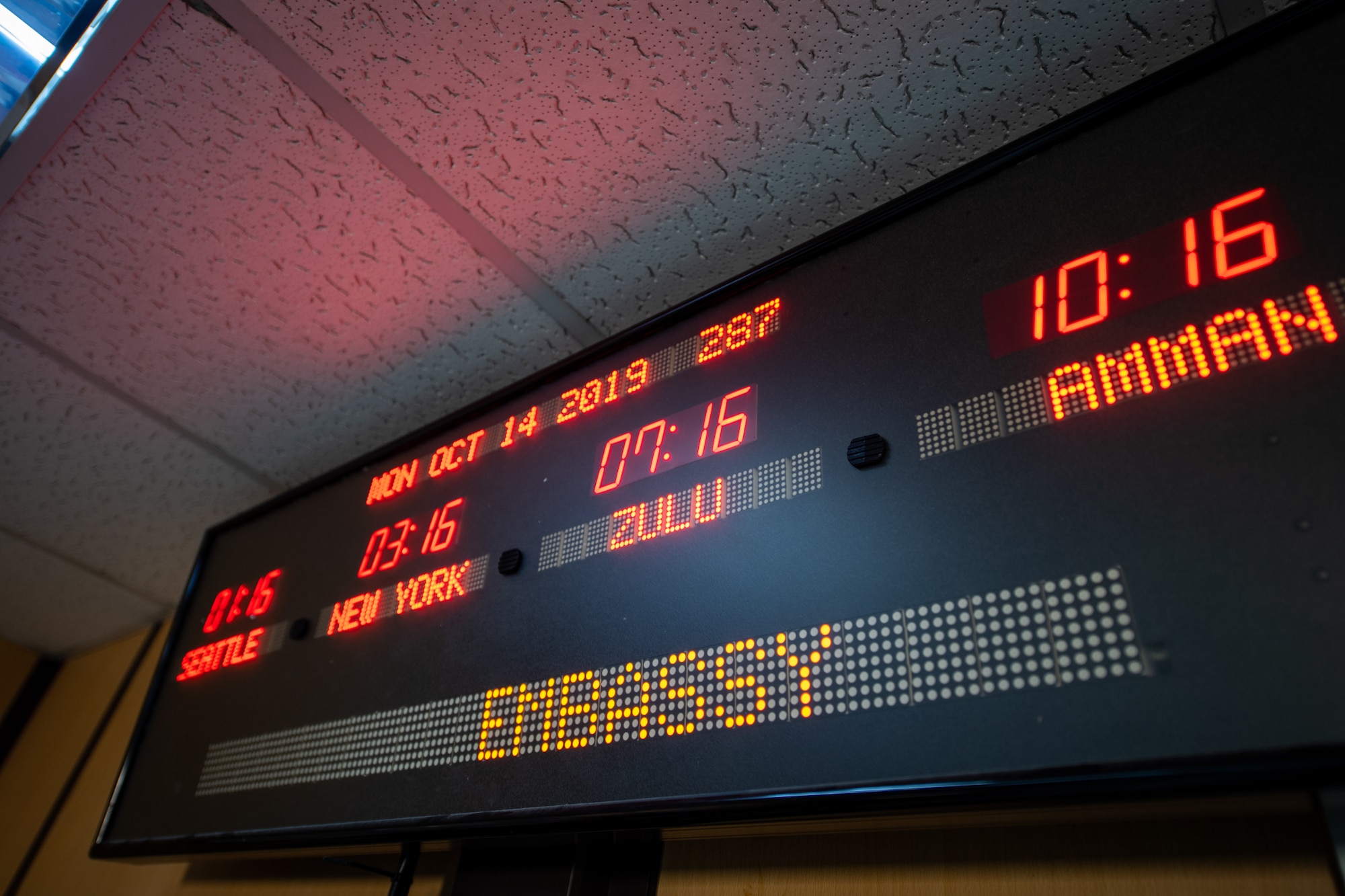 A clock displays the time in a port. Aerial porters are assigned through the Military Assistance Program to provide aerial logistics for the American Embassy to Jordan through the Military Assistance Program, handling cargo and passenger movement in support of State Department efforts in Jordan, Oct. 14, 2019. The porters are part of the Joint Expeditionary Tasking / Individual Augmentee program, providing Airmen the opportunity to fill roles outside of traditional Air Force operations.