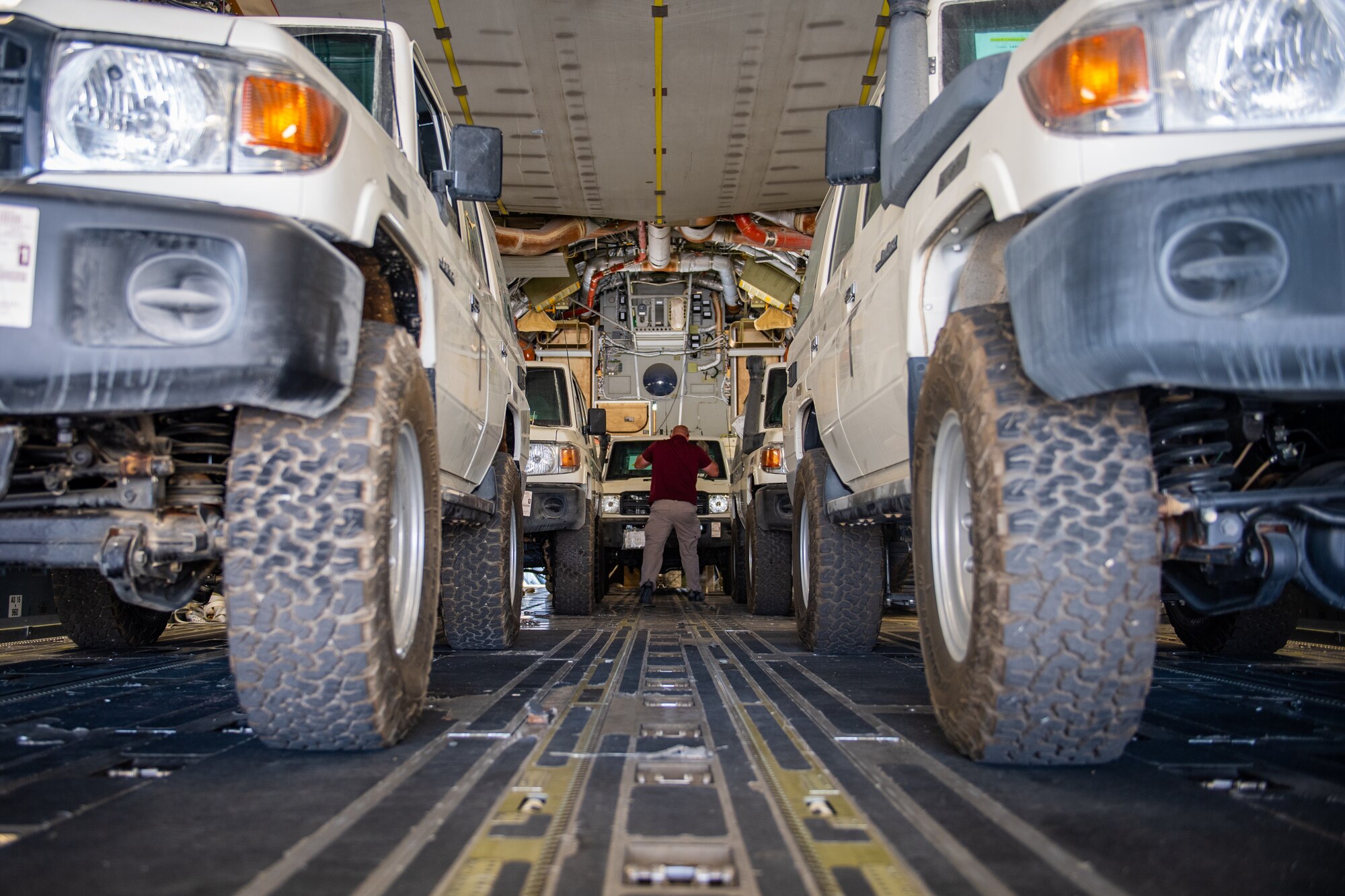 Tech. Sgt. Kyle Hersel, Assistant NCO-in-charge of Air Terminal Operations, Jordan Port, 387th Air Expeditionary Squadron, confirms the cargo manifest for a delivery of vehicles in Jordan, Oct. 14, 2019.