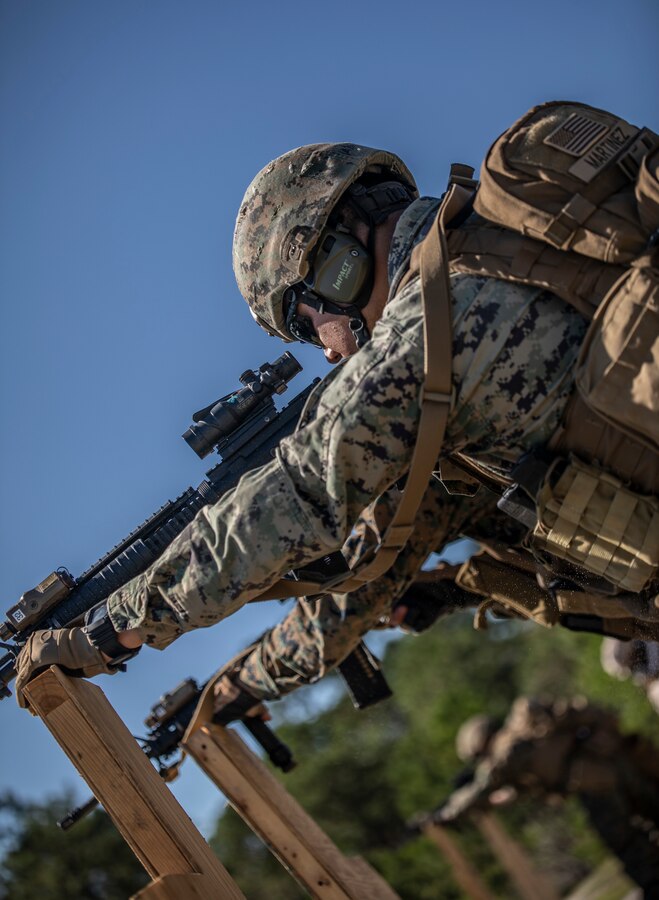U.S. Marines attached to Deployment Processing Command Reserve Support Unit-East, Force Headquarters Group, sight in on their targets at an unknown distance during table five at Range K501, Marine Corps Base Camp Lejeune, North Carolina, Oct. 17, 2019. The DPC/RSU-East provides support to non-mobilized Reserve Component unit training, conducts Individual Augment deployment/re-deployment processing, and supports activated Reserve units/dets while aboard Camp Lejeune in order to support total force integration during mobilization. (U.S. Marine Corps photo by Pfc. Leslie Alcaraz)