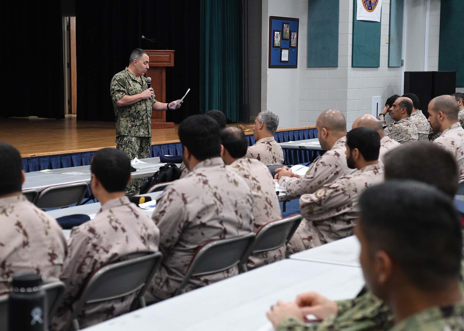 191021-N-KZ419-1055 NAVAL SUPPORT ACTIVITY BAHRAIN, Bahrain (Oct. 21, 2019) Rear Adm. Doug Beal, vice commander of U.S. 5th Fleet, U.S. Naval Forces Central Command and Combined Maritime Forces, speaks during the opening ceremony of International Maritime Exercise (IMX) 2019. IMX 2019 is a multinational engagement involving partners and allies from around the world sharing knowledge and experiences across the full spectrum of defensive maritime operations. The exercise serves to demonstrate global resolve in maintaining regional security and stability, freedom of navigation and the free flow of commerce from the Suez Canal south to the Bab-el-Mandeb through the Strait of Hormuz to the Northern Arabian Gulf. (U.S. Navy photo by Mass Communication Specialist 3rd Class Dawson Roth/Released)