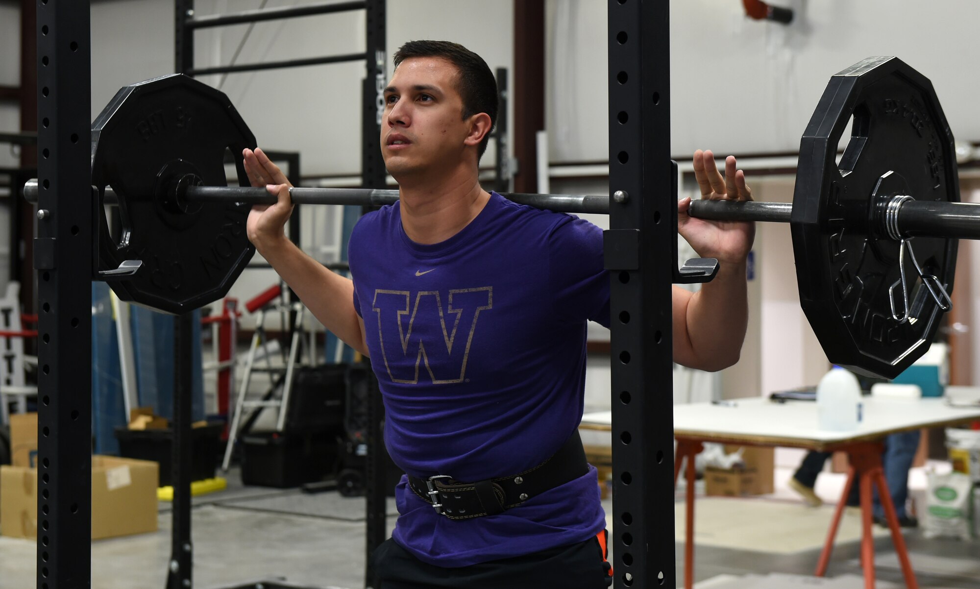 Staff Sgt. Darvin, 432nd Support Squadron cyber transport systems supervisor, lifts weights in the Reaper Fitness Center at Creech Air Force Base, Nevada, Oct. 16, 2019. The Reaper Fitness Center is available for use 24/7 with a code from force support airmen. (U.S. Air Force photo by Airman 1st Class William Rio Rosado)