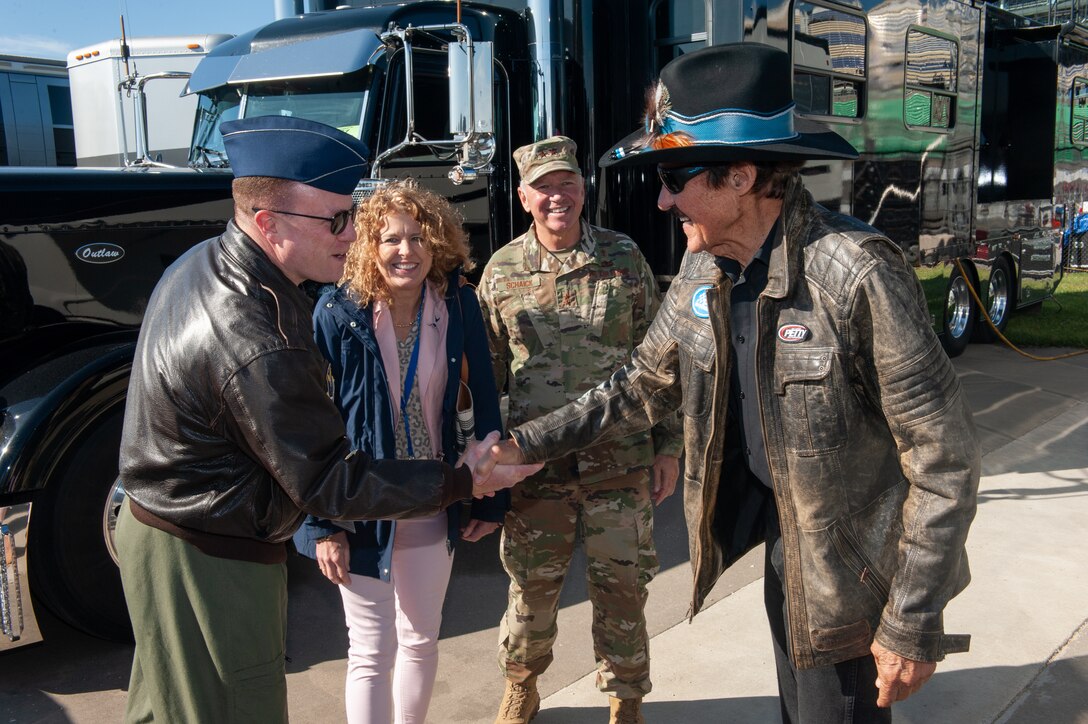Team Whiteman Airmen supported the local community at Kansas City, Mo., Oct. 20, 2019, during the Kansas Speedway Hollywood Casino 400 Sprint Cup. Service members took time to greet and meet with local community members, performed the National Anthem and displayed the B-2 Spirit with a flyover during the opening ceremony. (U.S. Air Force photo by Senior Airman Thomas Barley)