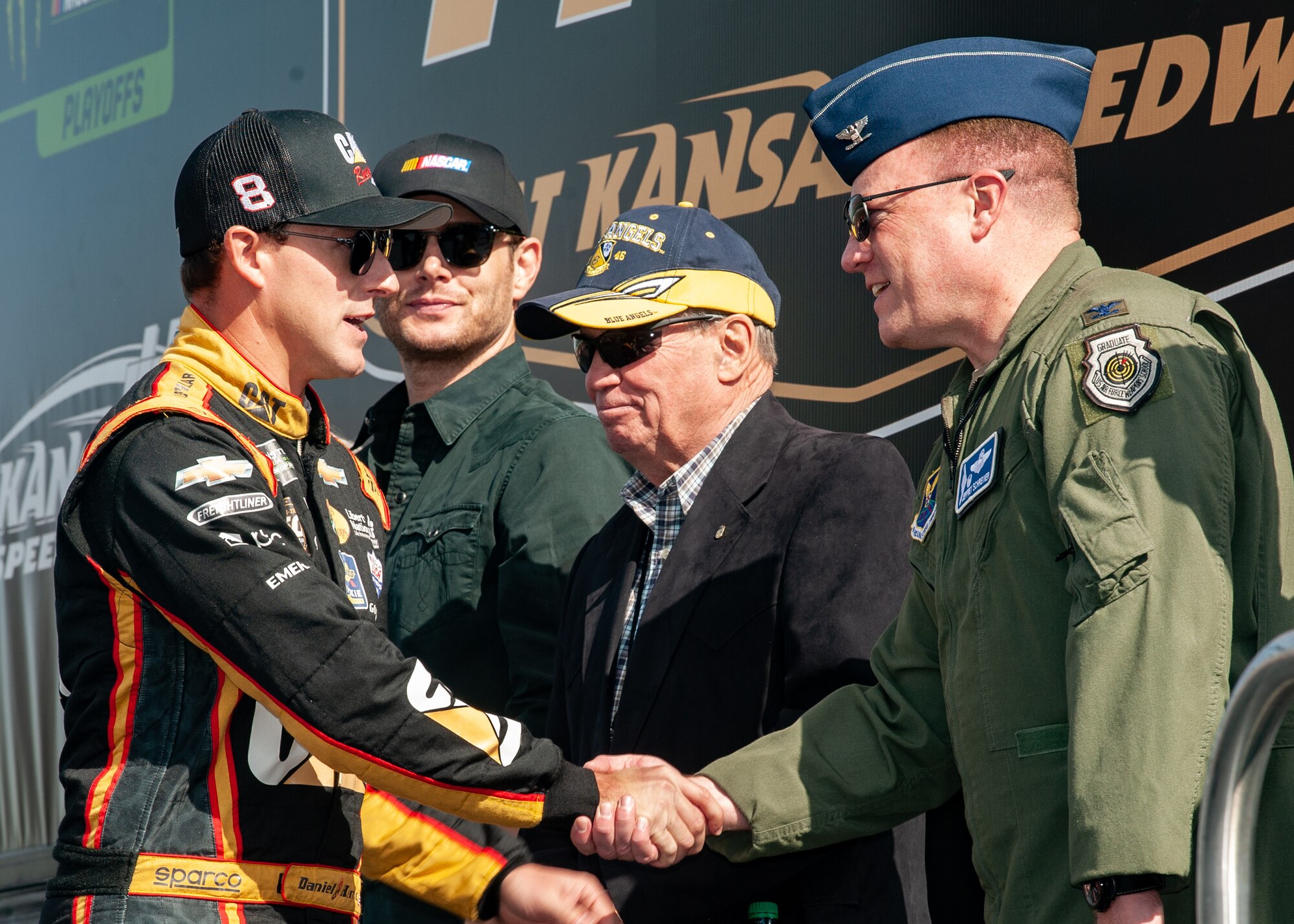 Team Whiteman Airmen supported the local community at Kansas City, Mo., Oct. 20, 2019, during the Kansas Speedway Hollywood Casino 400 Sprint Cup. Service members took time to greet and meet with local community members, performed the National Anthem and displayed the B-2 Spirit with a flyover during the opening ceremony. (U.S. Air Force photo by Senior Airman Thomas Barley)