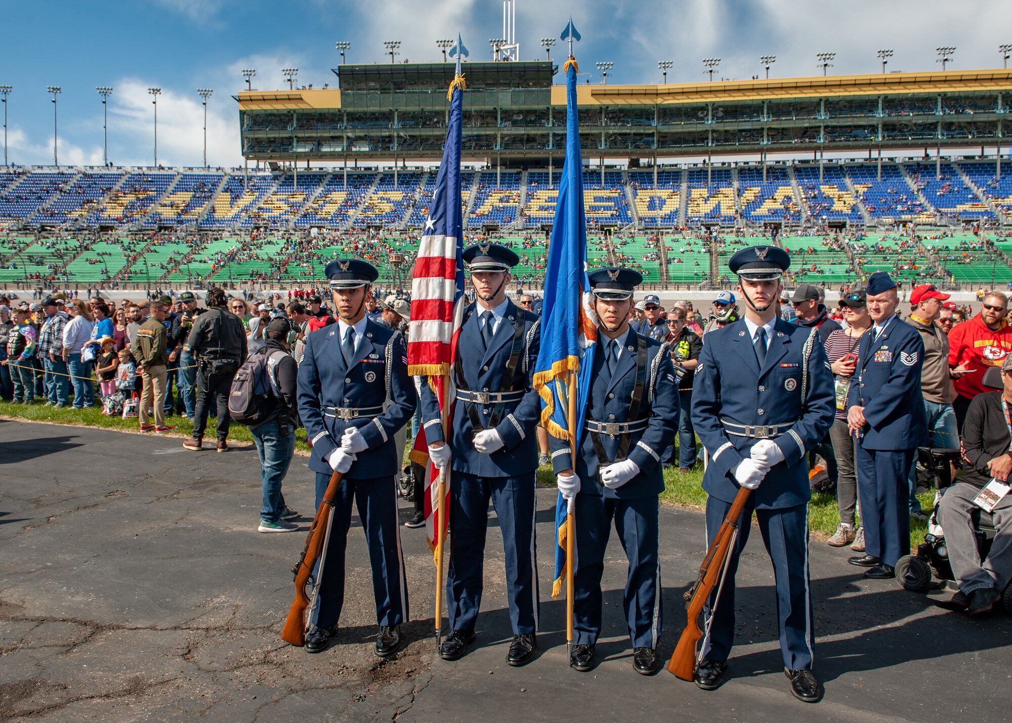 Team Whiteman Airmen supported the local community at Kansas City, Mo., Oct. 20, 2019, during the Kansas Speedway Hollywood Casino 400 Sprint Cup. Service members took time to greet and meet with local community members, performed the National Anthem and displayed the B-2 Spirit with a flyover during the opening ceremony. (U.S. Air Force photo by Senior Airman Thomas Barley)