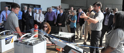 IMAGE: DAHLGREN, Va. – (Sept. 19, 2019) - Kyle Dalton, Naval Surface Warfare Center Dahlgren Division (NSWCDD) Sly Fox Mission 26 team member, 
briefs visitors on PERSEUS during a demonstration held for distinguished visitors. Dalton and the Mission 26 team of junior scientists and engineers briefed military, government civilians, and defense contractors five times over the course of two days on their development of PERSEUS – the most recent effort in a line of projects solving the integration of high-powered electric weapon systems and electric propulsion systems. (U.S. Navy photo/Released)