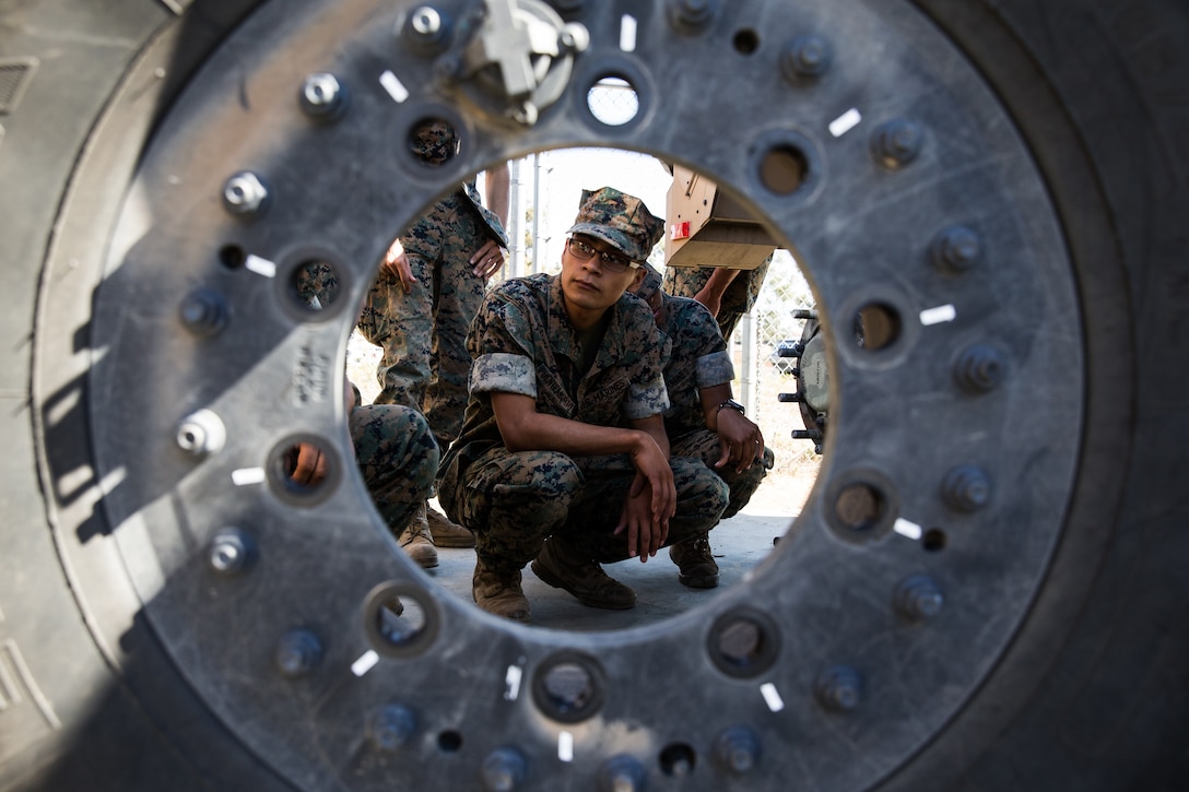 U.S. Marine Lance Cpl. Xavier Puente, a mortarman with Weapons Company, 1st Battalion, 5th Marine Regiment, 1st Marine Division, listens to an instructor during the I Marine Expeditionary Force Joint Light Tactical Vehicle Operator New Equipment Training course in 13 Area on Marine Corps Base Camp Pendleton, California, Oct. 16, 2019. The JLTV OPNET course is an eight day training evolution teaching students the vehicle’s characteristics, operations, operator maintenance and safety. Puente is a native of Elkhorn, Wisconsin.