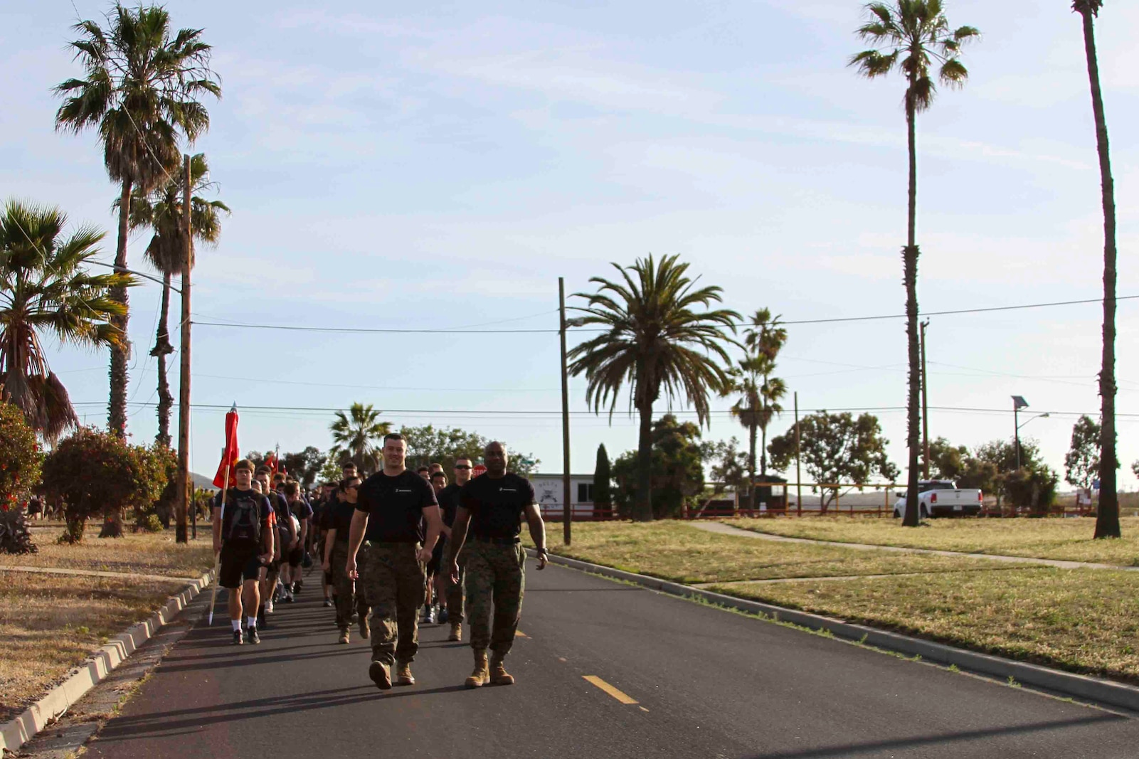 U.S. Marines and poolees from Recruiting Station San Diego hike at Camp Pendleton, May 17, 2019. The 'Spartan Night' helps prepare poolees for what to expect while in boot camp and build comradery. (U.S. Marine Corps photo by Sgt. Bernadette Plouffe)