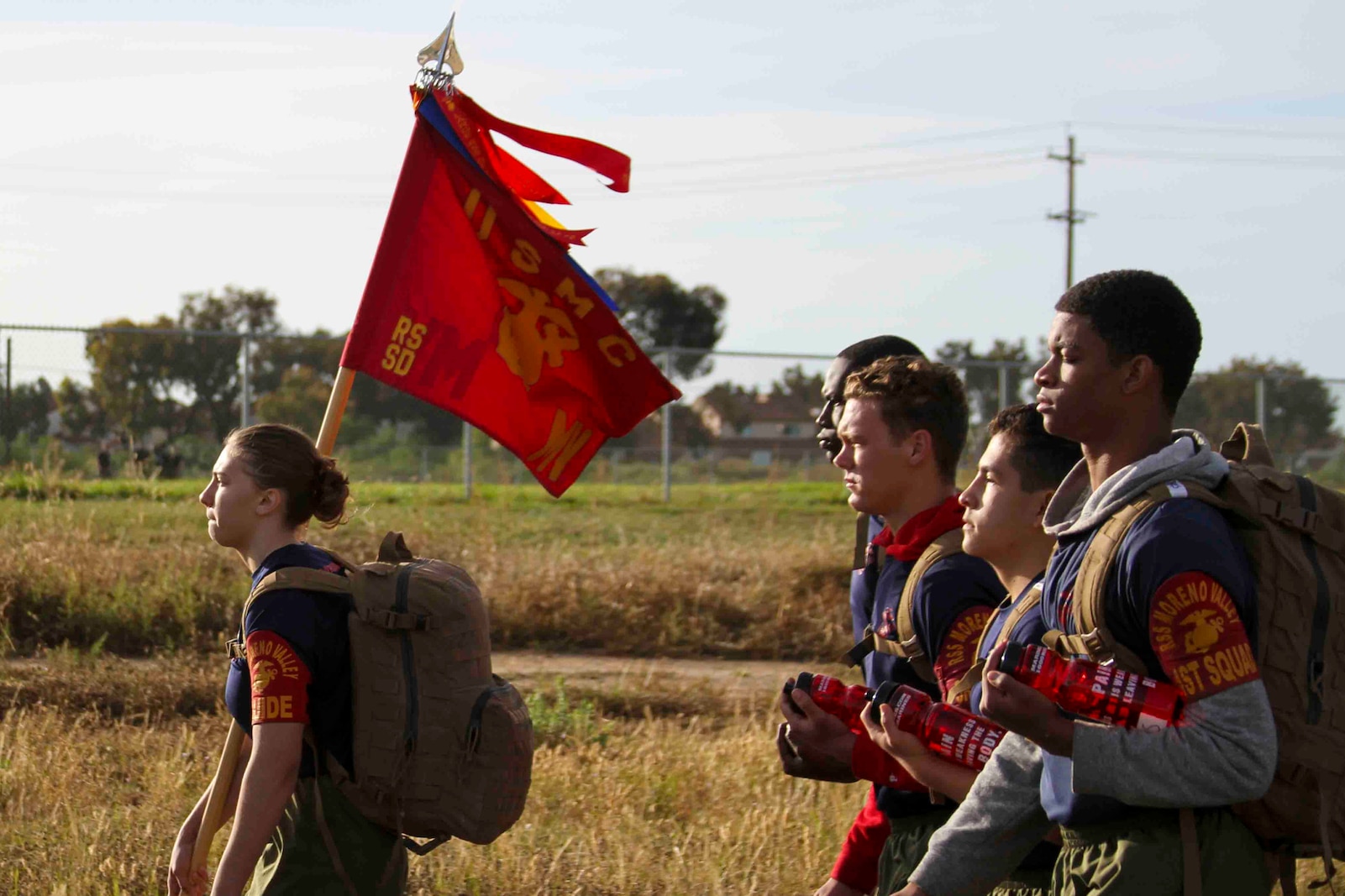 U.S. Marine Corps poolees from Recruiting Station San Diego hike at Camp Pendleton, Calif., May 17, 2019. The 'Spartan Night' helps prepare poolees for what to expect while in boot camp and build comradery. (U.S. Marine Corps photo by Sgt. Bernadette Plouffe)