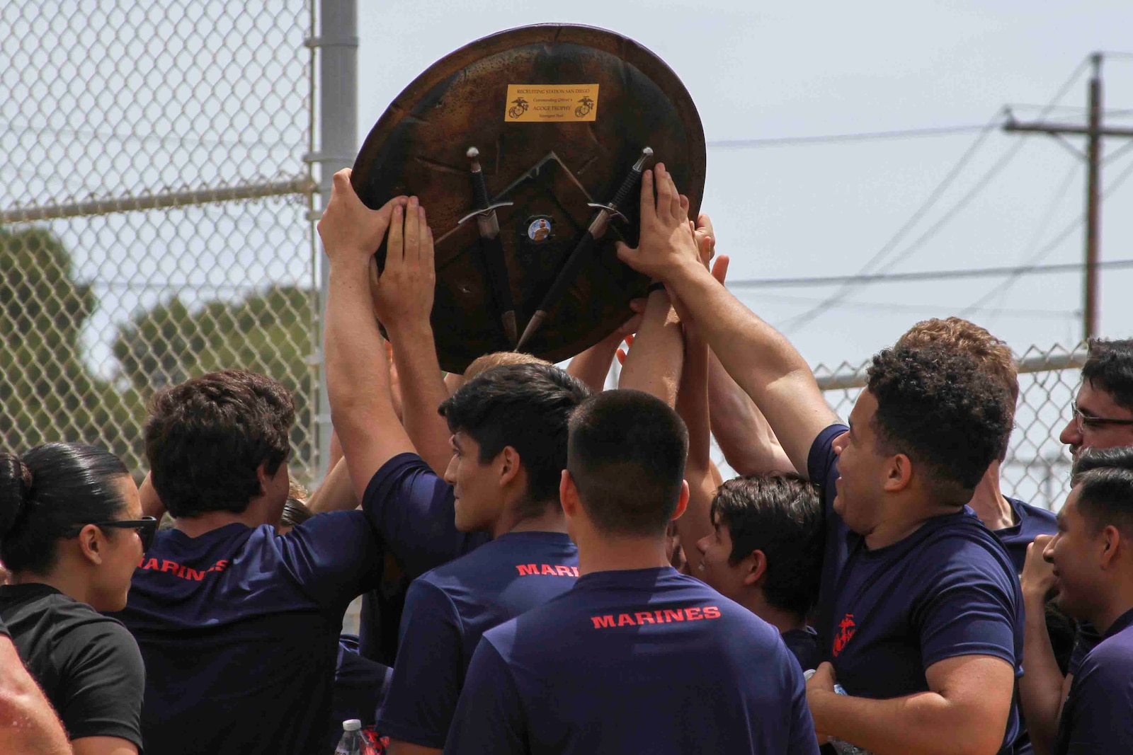 The Spartan Shield is presented to the poolees of Recruiting Sub-Station Escondido at Camp Pendleton, Calif., May 17, 2019. The 'Spartan Night' helps prepare poolees for what to expect while in boot camp and build comradery. The shield is presented to the strongest poolees.