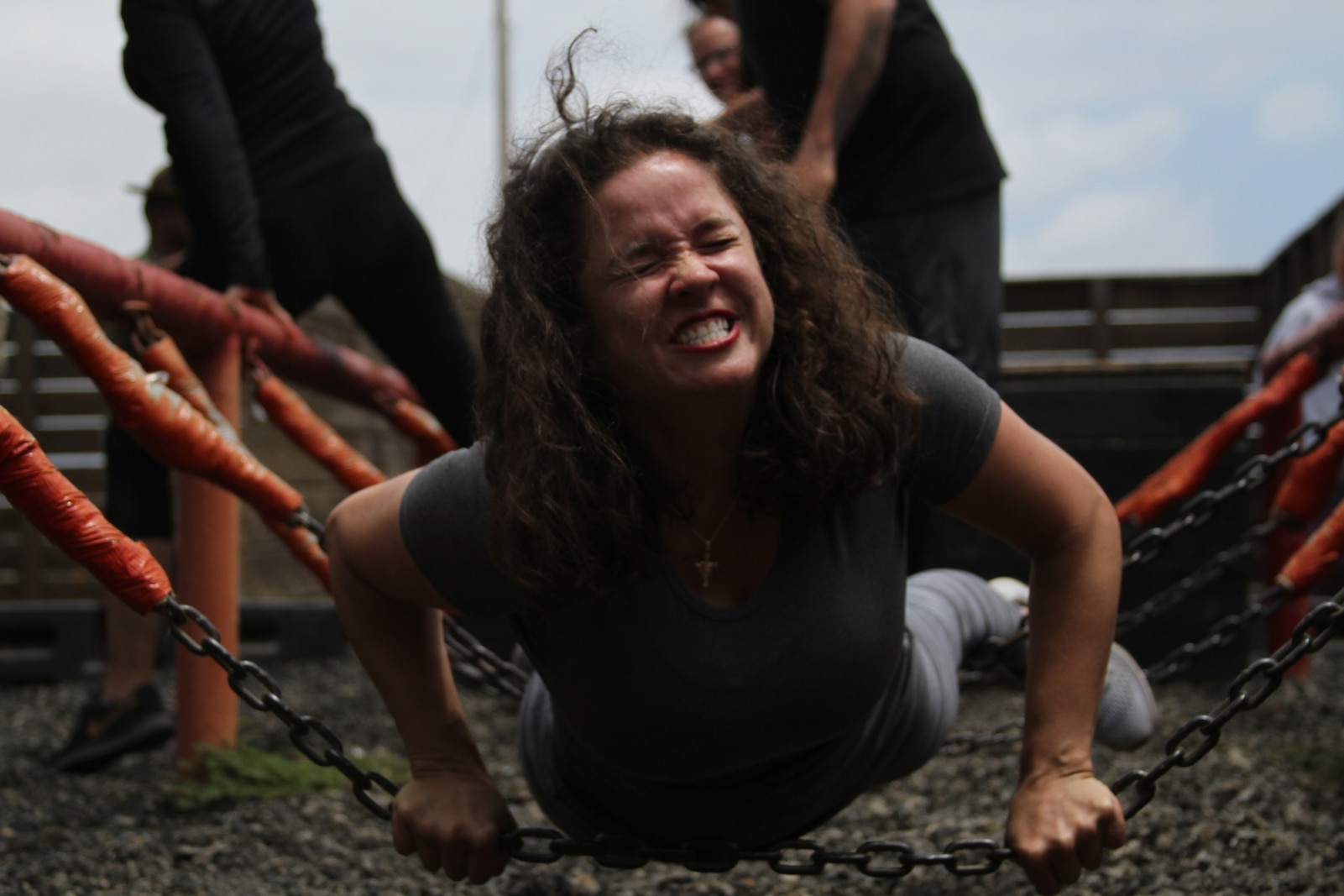 Educators from the San Diego area maneuver through the Leadership Reaction Course during the Educators' Workshop at Marine Corps Recruit Depot San Diego, June 17, 2019. The Educators' Workshop provides and in-depth experience about the transformation young men and women go through on their journey to claim the title Marine. (U.S. Marine Corps photo by Sgt. Bernadette Plouffe)