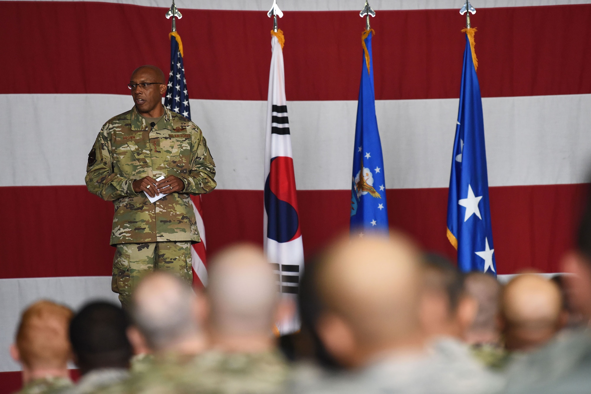 Gen. CQ Brown, Jr., Pacific Air Forces commander, details his priorities to the men and women of Team Osan during an all call at Osan Air Base, Republic of Korea, Oct. 17, 2019. While gaining an in-depth exposure of the installation’s unique mission, Brown used the visit as an opportunity to explain PACAF’s priorities and how vital Team Osan is in contributing to the Indo-Pacific region’s security and stability. (U.S. Air Force photo by Staff Sgt. Benjamin Bugenig)