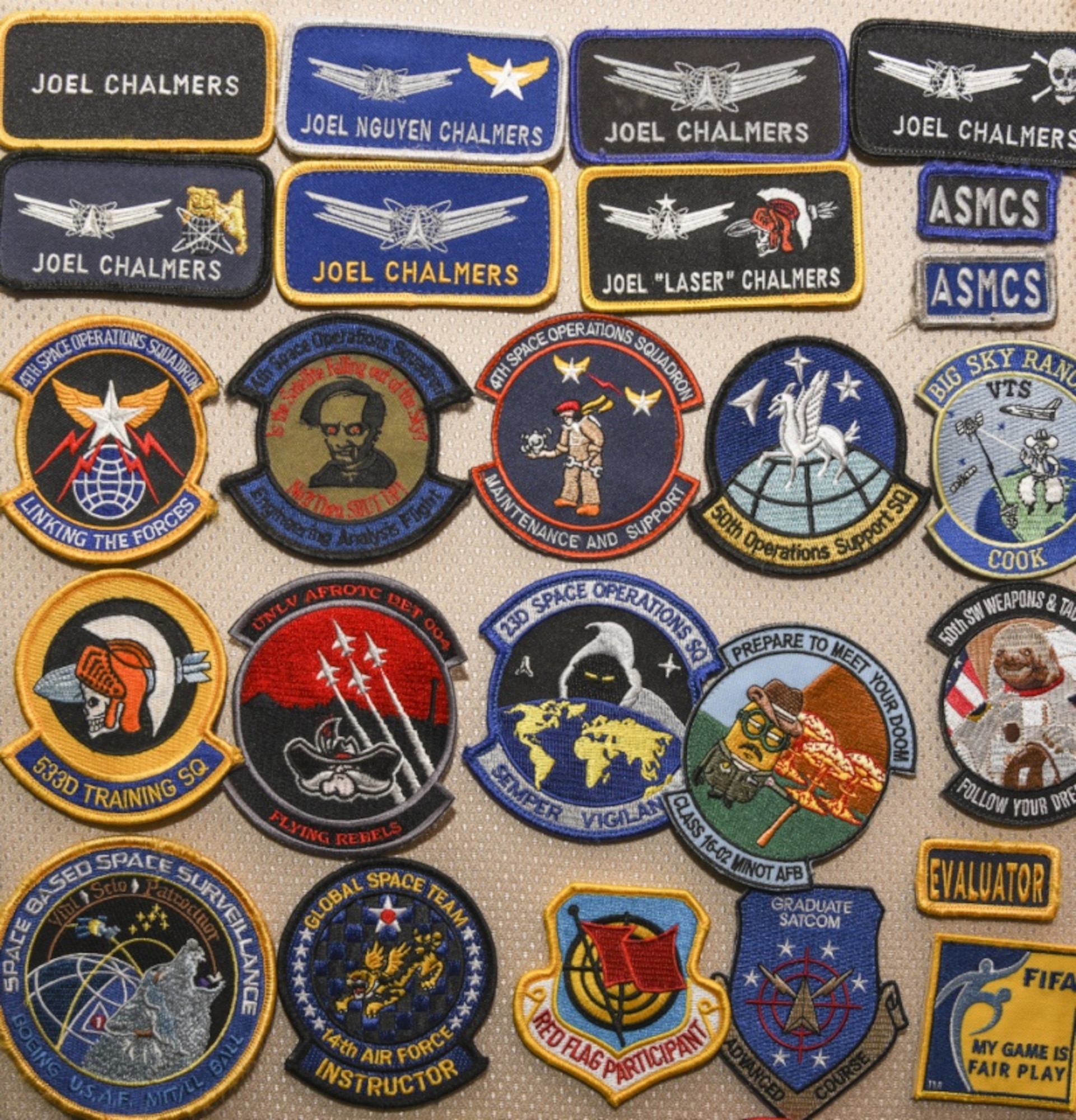 Patches owned by Major Joel N. Chalmers, 36th Wing Inspector General director of investigations, are displayed on Andersen Air Force Base, Guam, Oct. 2, 2019.