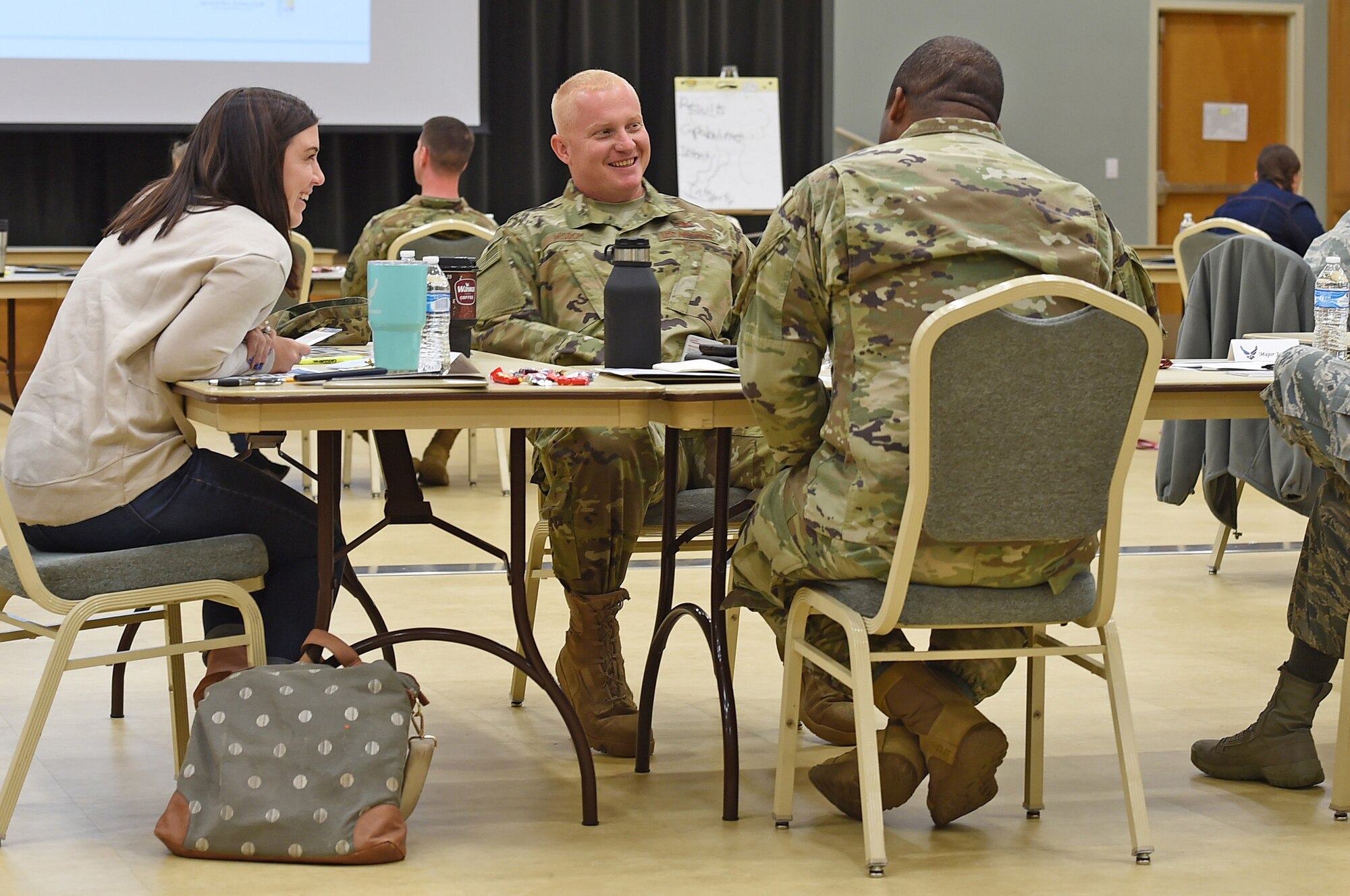 People sit at a table and discuss