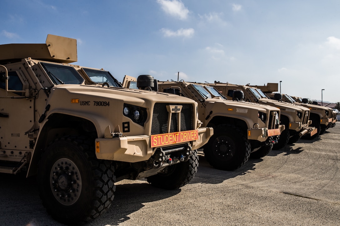 Joint Light Tactical Vehicles are staged prior to the I Marine Expeditionary Force JLTV Operator New Equipment Training course in 13 Area on Marine Corps Base Camp Pendleton, California, Oct. 17, 2019. The JLTV OPNET course is an eight day training evolution teaching students the vehicle’s characteristics, operations, operator maintenance and safety.