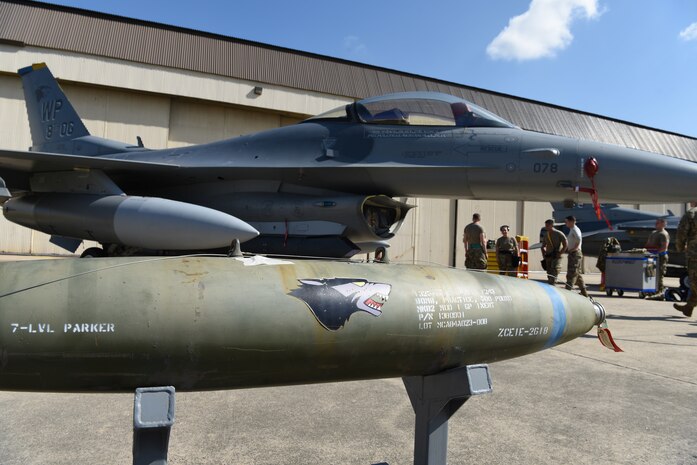 A bomb is ready to be loaded onto an F-16 Fighting Falcon aircraft during the 2019 Penn Fest competition at Kunsan Air Base, Republic of Korea, Oct. 19, 2019. During the load crew competition of the event, each team had to load two bombs and a missile onto their aircraft as quickly and accurately as possible. (U.S. Air Force photo by Staff Sgt. Joshua Edwards)