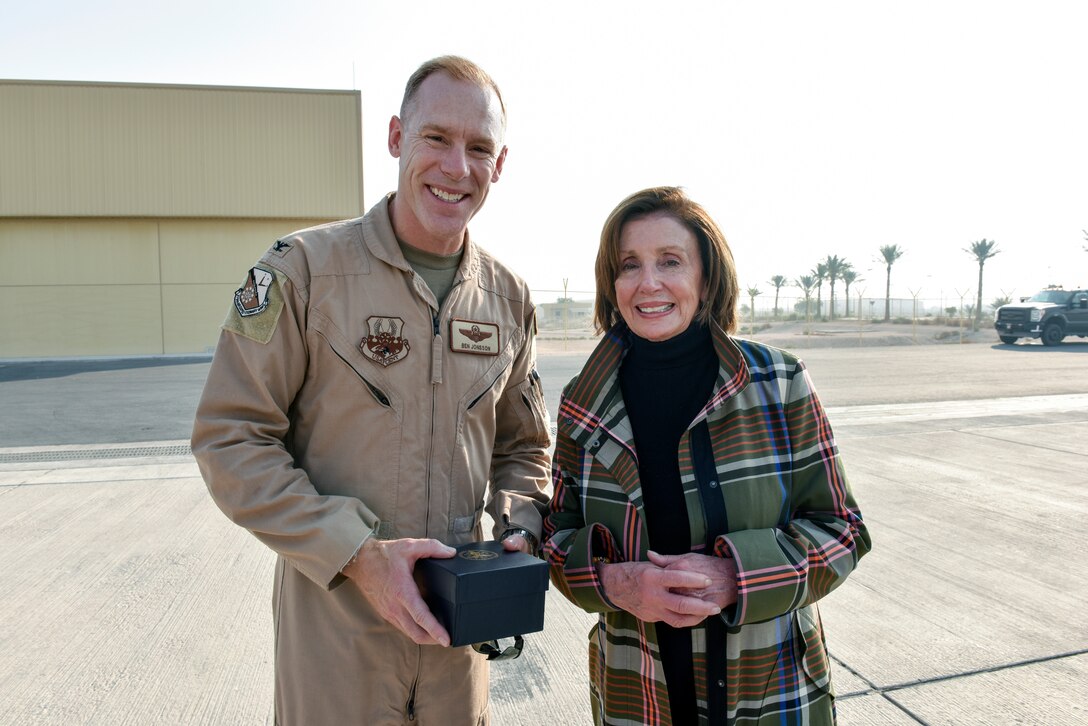 Col. Ben Jonsson, 379th Air Expeditionary Wing vice commander, poses for a photograph with Speaker of the U.S. House of Representatives Nancy Pelosi during a congressional delegation visit at Al Udeid Air Base, Qatar on Oct. 21, 2019. The delegation also included members of the House Committee of Foreign Affairs, House Homeland Security Committee, House Permanent Select Committee on Intelligence, House Armed Services Committee, House Ways and Means Committee and House Committee on Oversight and Government Reform. (U.S. Air Force photo by Tech. Sgt. John Wilkes)