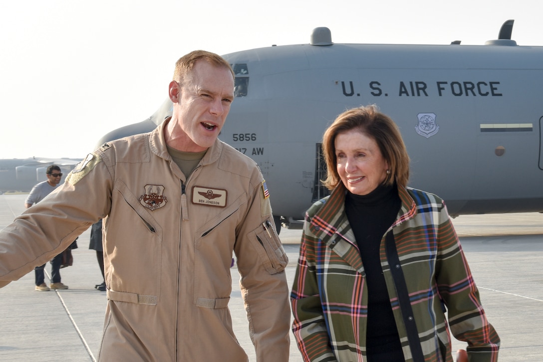 Col. Ben Jonsson, 379th Air Expeditionary Wing vice commander, greets Speaker of the U.S. House of Representatives Nancy Pelosi. The delegation also included members of the House Committee of Foreign Affairs, House Homeland Security Committee, House Permanent Select Committee on Intelligence, House Armed Services Committee, House Ways and Means Committee and House Committee on Oversight and Government Reform. (U.S. Air Force photo by Tech. Sgt. John Wilkes)
