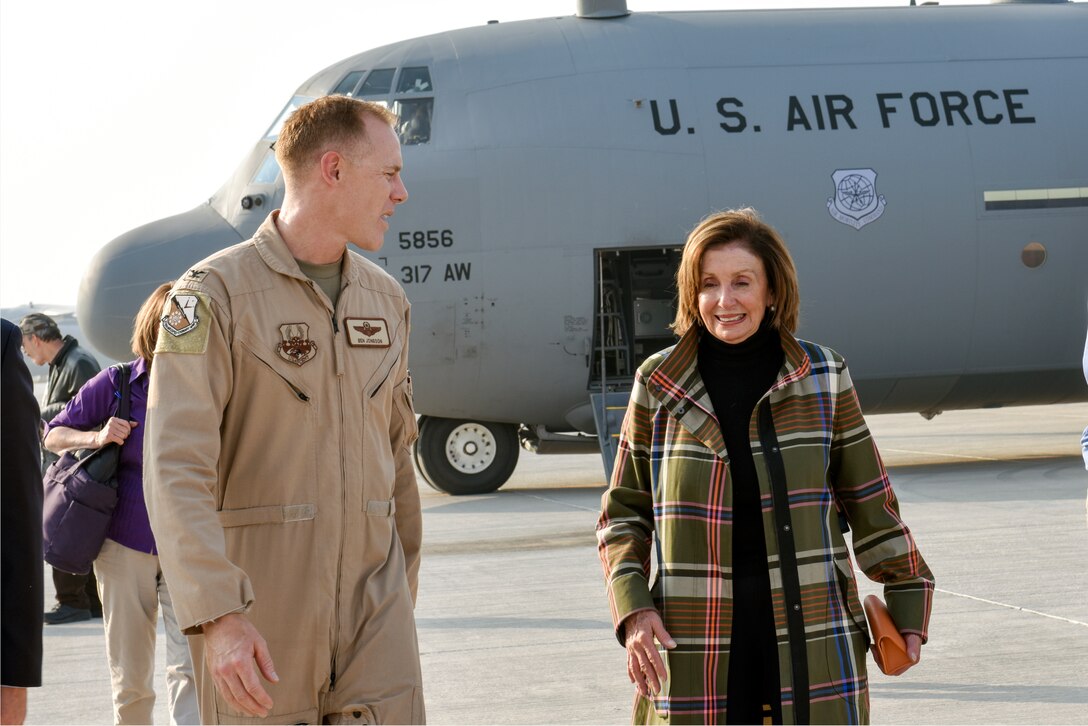 Col. Ben Jonsson, 379th Air Expeditionary Wing vice commander, greets Speaker of the U.S. House of Representatives Nancy Pelosi. The delegation also included members of the House Committee of Foreign Affairs, House Homeland Security Committee, House Permanent Select Committee on Intelligence, House Armed Services Committee, House Ways and Means Committee and House Committee on Oversight and Government Reform. (U.S. Air Force photo by Tech. Sgt. John Wilkes)