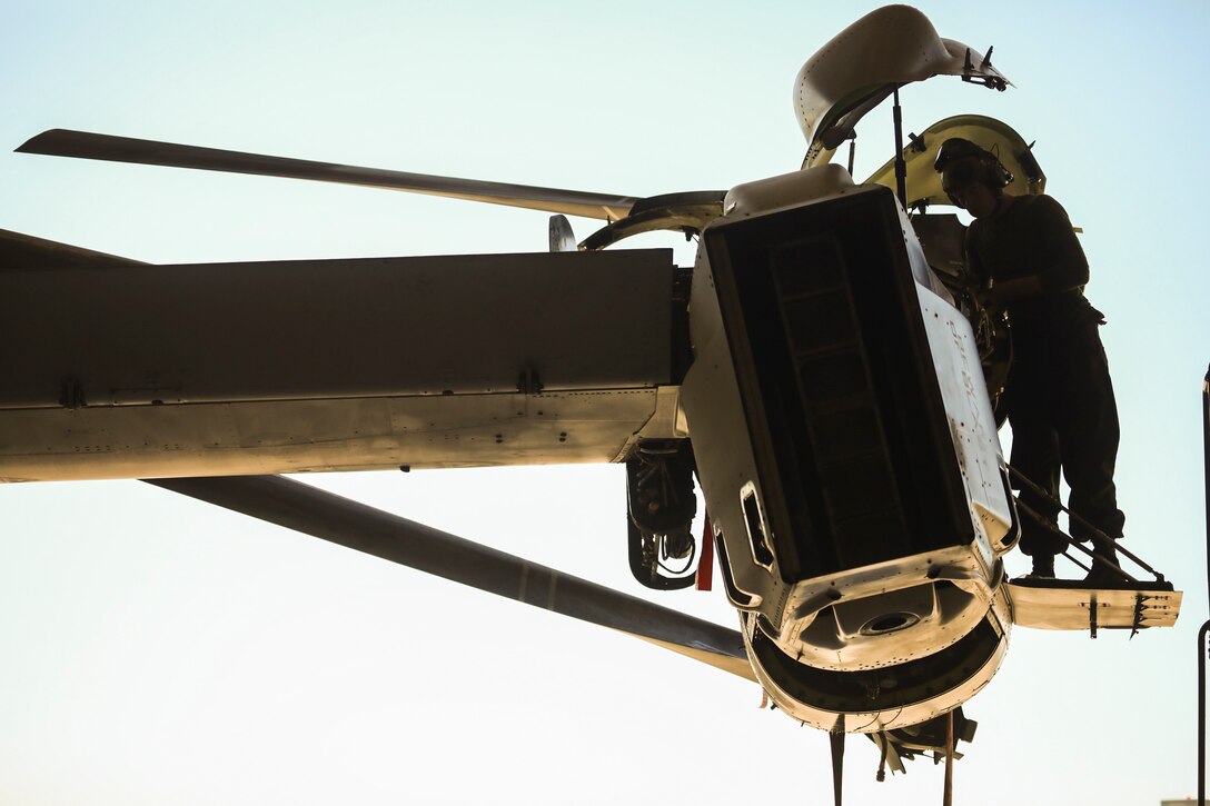 U.S. Marine Corps Cpl. Tristen Angle, a tiltrotor mechanic with Marine Medium Tiltrotor Squadron 165, Marine Aircraft Group 16, 3rd Marine Aircraft Wing, performs maintenance on an MV-22B Osprey at Marine Corps Air Station Miramar, Calif., Oct. 21, 2019.  As America’s “Force in Readiness,” 3rd MAW’s Marines remain ready to respond to crises anytime, anywhere. (Marine Corps photo by Lance Cpl. Jacob Pruitt)