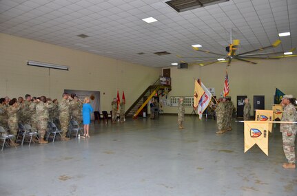 Soldiers, family, and friends salute the nation’s colors during the playing of the National Anthem at the Army Reserve Sustainment Command’s Assumption of Command Ceremony for Brig. Gen. Donald Absher October 20, 2019.