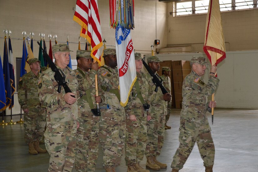 Command Sgt. Maj. Christopher Luchsinger, command sergeant major of the Army Reserve Sustainment Command in Birmingham, prepares the unit’s colors during the Assumption of Command Ceremony on October 20, 2019.