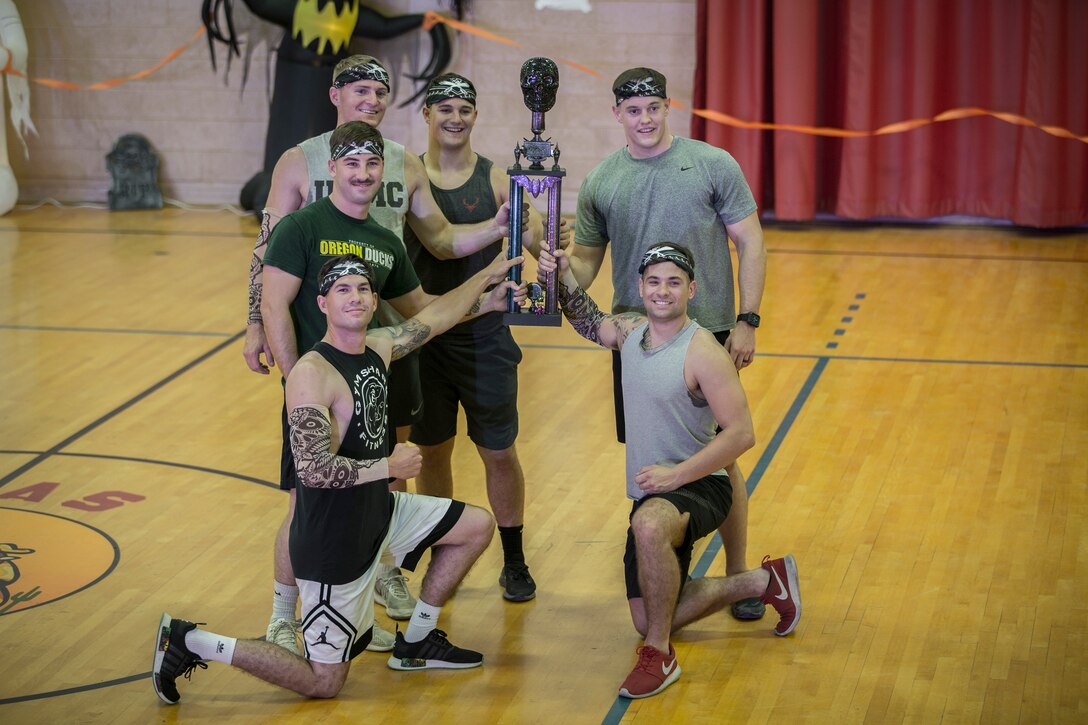 U.S. Marines with Marine Corps Air Station (MCAS) Yuma, compete in the annual "Dodge of the Dead" dodgeball tournament at the gymnasium aboard MCAS Yuma, Ariz., Oct. 15, 2019. The Single Marine Marine Program sponsored event pitted teams of 6 costume clad service members against each other in a fierce competition. (U.S. Marine Corps photo by Lance Cpl John Hall)