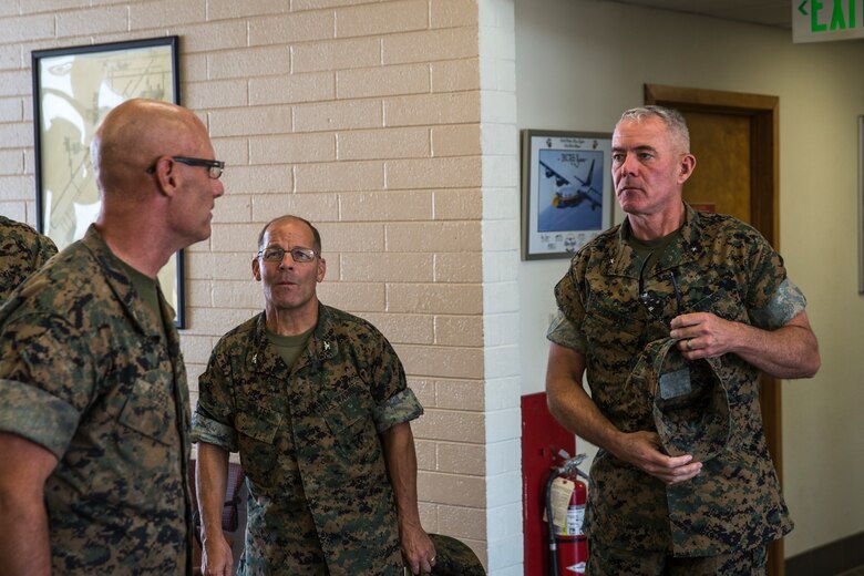 U.S. Marine Corps Brig. Gen. David B. Conley, the Marine Corps Installations - West (MCI-WEST) Commanding General visits Marine Corps Air Station (MCAS) Yuma, Ariz., Oct. 16, 2019. This is Brig. Gen. Conley's first visit to MCAS Yuma, during which he recieved a tour of the aircraft hangars, barracks, station facilities and met with Col. David A. Suggs, the commanding officer of MCAS Yuma. (U.S. Marine Corps photo by Sgt. Isaac D. Martinez)