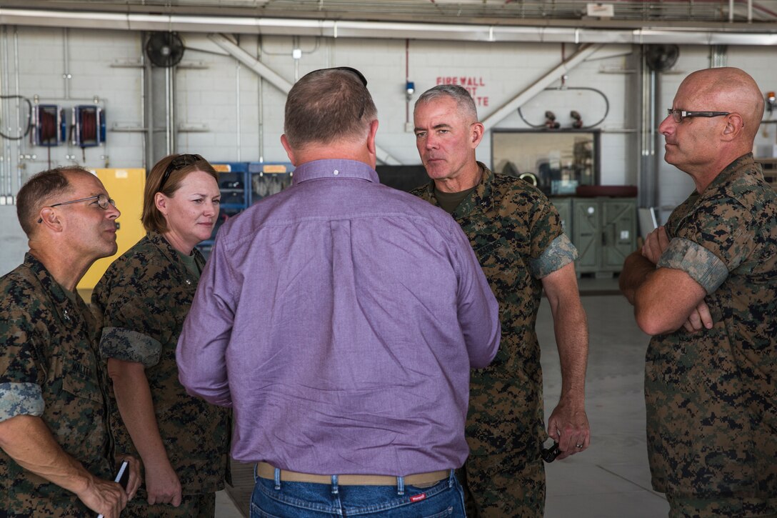 U.S. Marine Corps Brig. Gen. David B. Conley, the Marine Corps Installations - West (MCI-WEST) Commanding General visits Marine Corps Air Station (MCAS) Yuma, Ariz., Oct. 16, 2019. This is Brig. Gen. Conley's first visit to MCAS Yuma, during which he recieved a tour of the aircraft hangars, barracks, station facilities and met with Col. David A. Suggs, the commanding officer of MCAS Yuma. (U.S. Marine Corps photo by Sgt. Isaac D. Martinez)