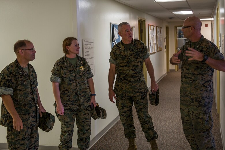 U.S. Marine Corps Brig. Gen. David B. Conley, the Marine Corps Installations - West (MCI-WEST) Commanding General visits Marine Corps Air Station (MCAS) Yuma, Ariz., Oct. 16, 2019. This is Brig. Gen. Conley's first visit to MCAS Yuma, during which he recieved a tour of the aircraft hangars, barracks, station facilities and met with Col. David A. Suggs, the commanding officer of MCAS Yuma. (U.S. Marine Corps photo by Sgt. Isaac D. Martinez)