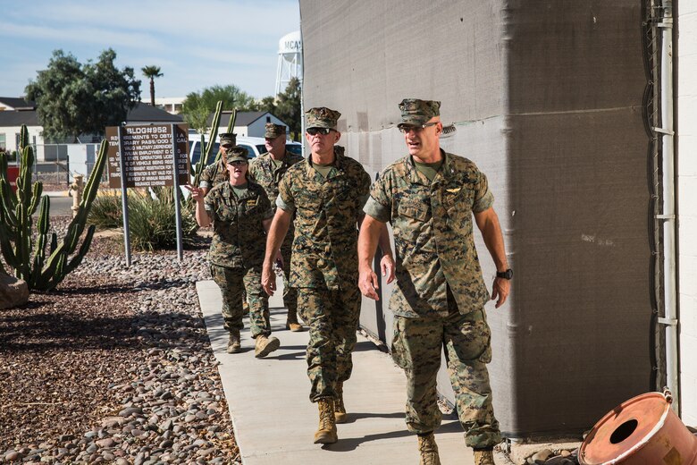 U.S. Marine Corps Brig. Gen. David B. Conley, the Marine Corps Installations - West (MCI-WEST) Commanding General visits Marine Corps Air Station (MCAS) Yuma, Ariz., Oct. 16, 2019. This is Brig. Gen. Conley's first visit to MCAS Yuma, during which he recieved a tour of the aircraft hangars, barracks, station facilities and met with Col. David A. Suggs, the commanding officer of MCAS Yuma. (U.S. Marine Corps photo by Sgt. Isaac D. Martinez)